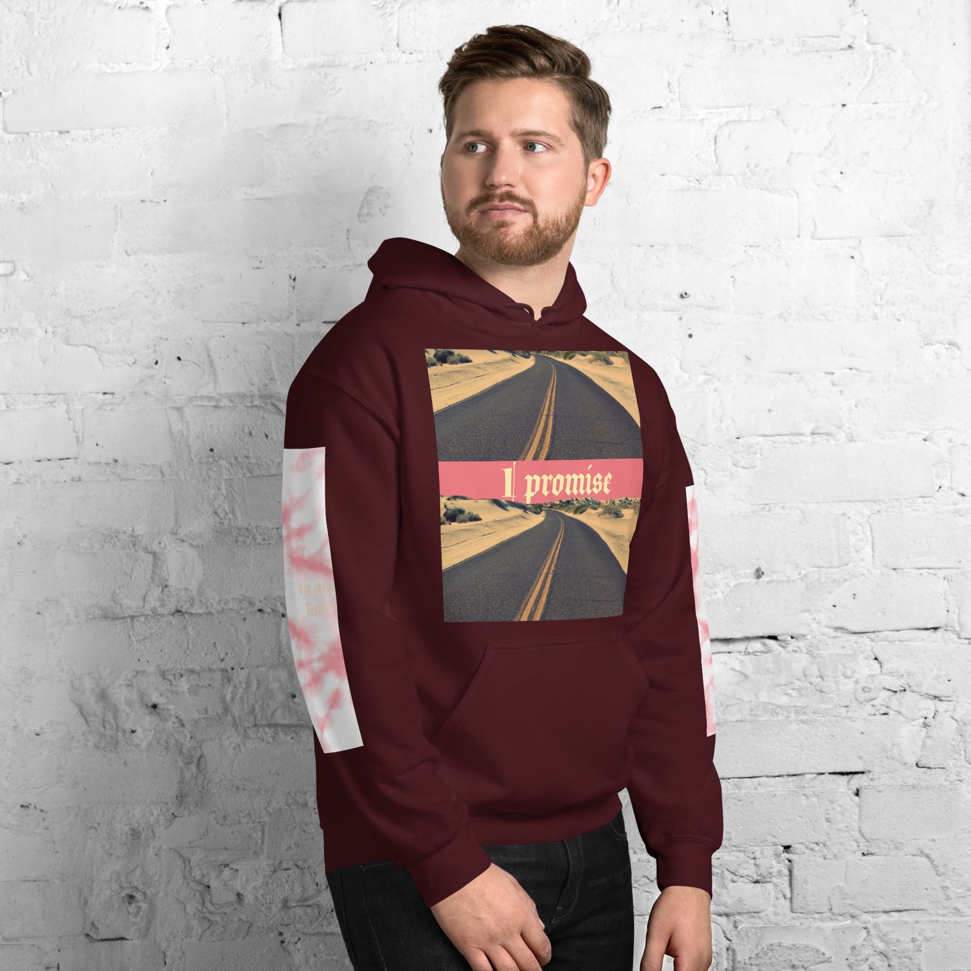 Man wearing maroon hoodie, "I promise" design.