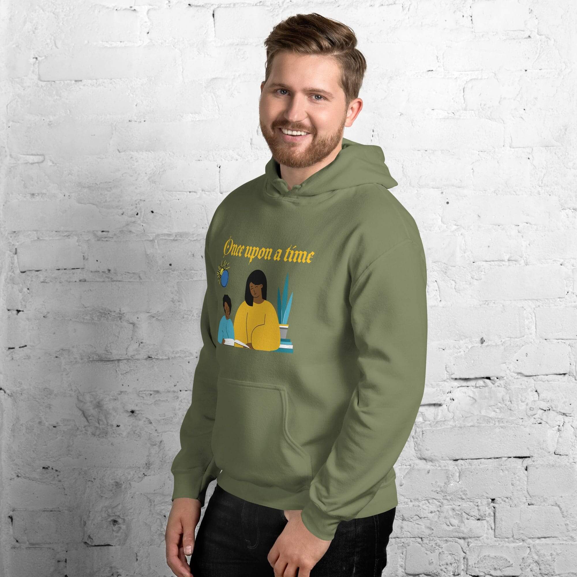 Smiling man in olive hoodie with story graphic