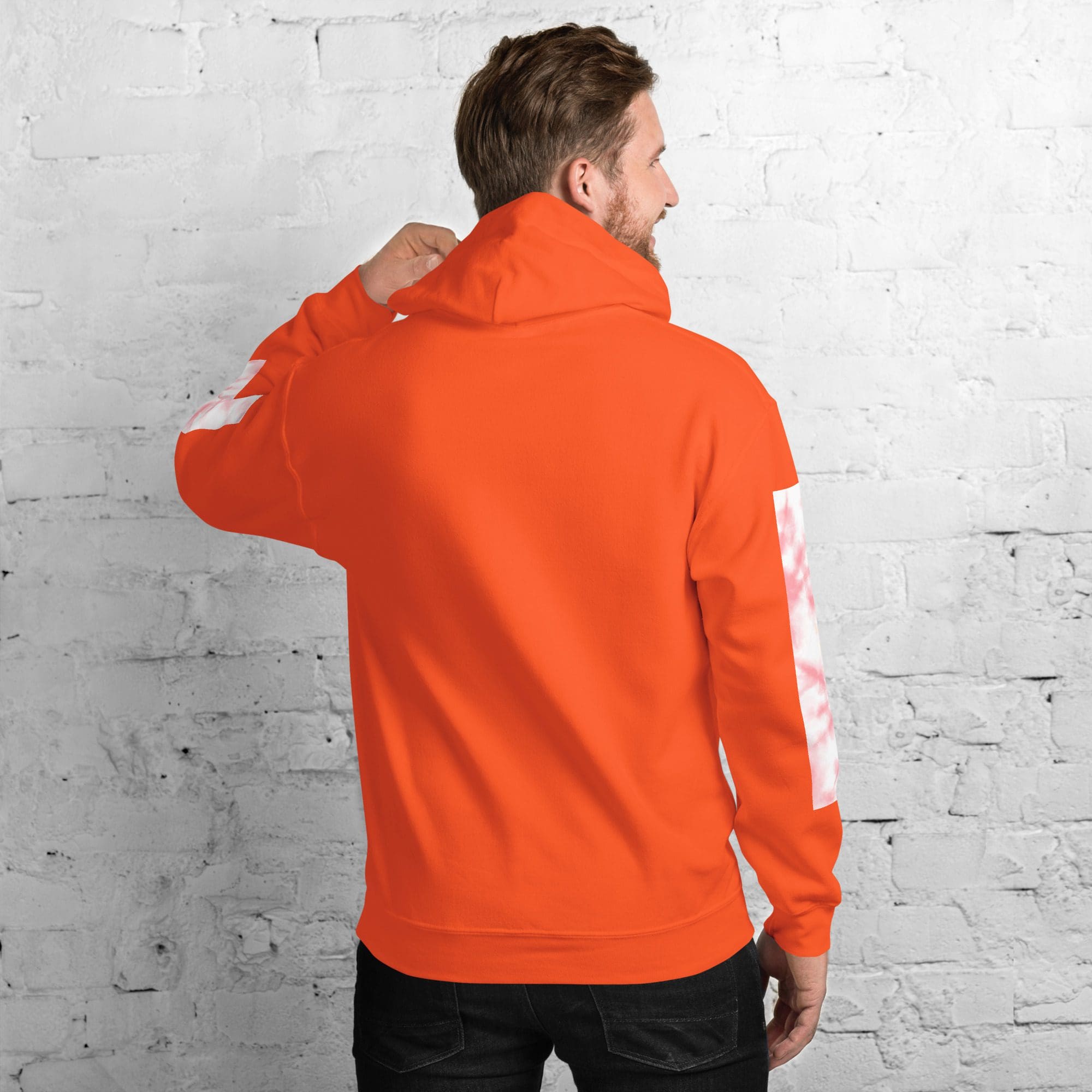 Back view of man in orange hoodie