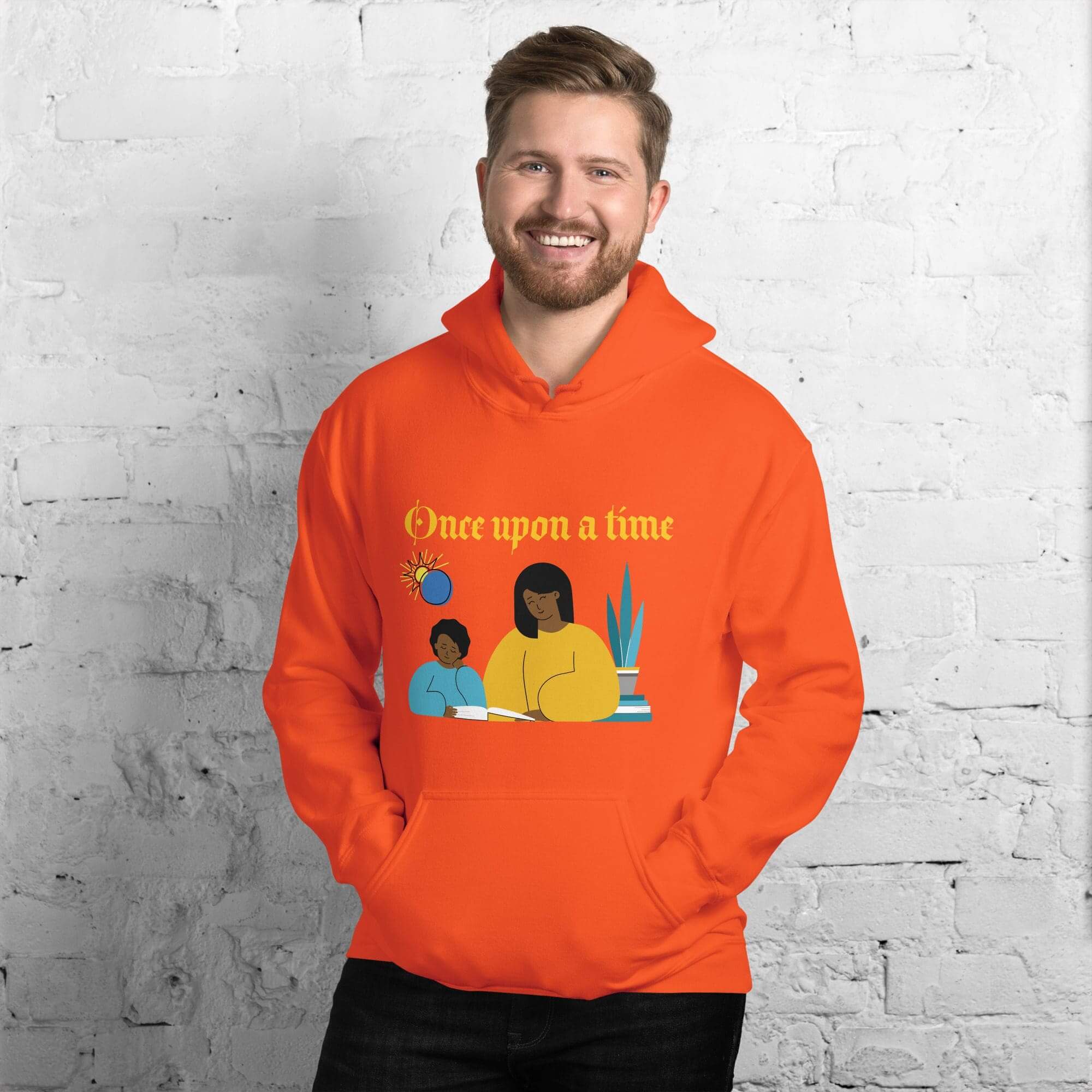 Man wearing orange hoodie with illustrated design.