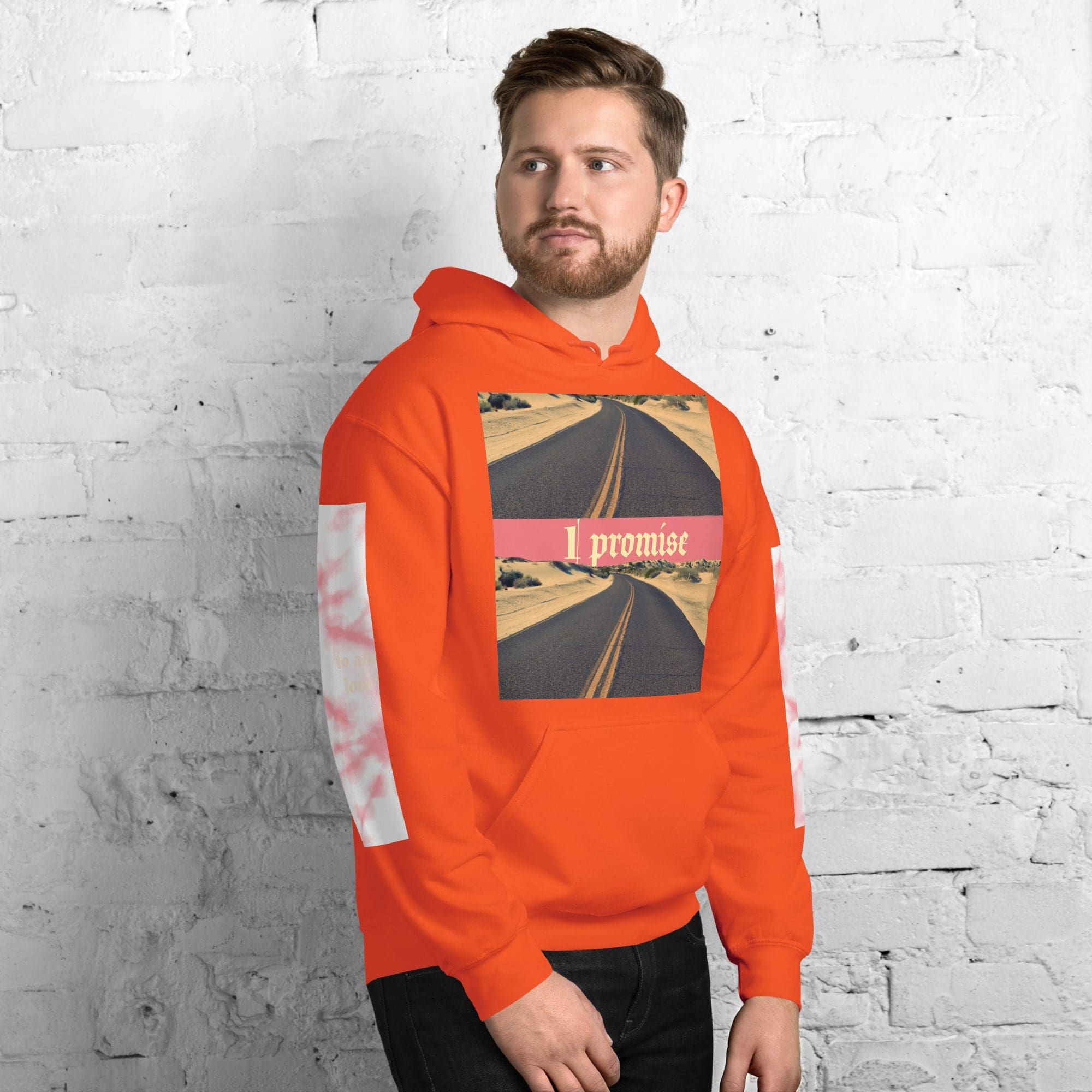 Man wearing orange hoodie with road design.