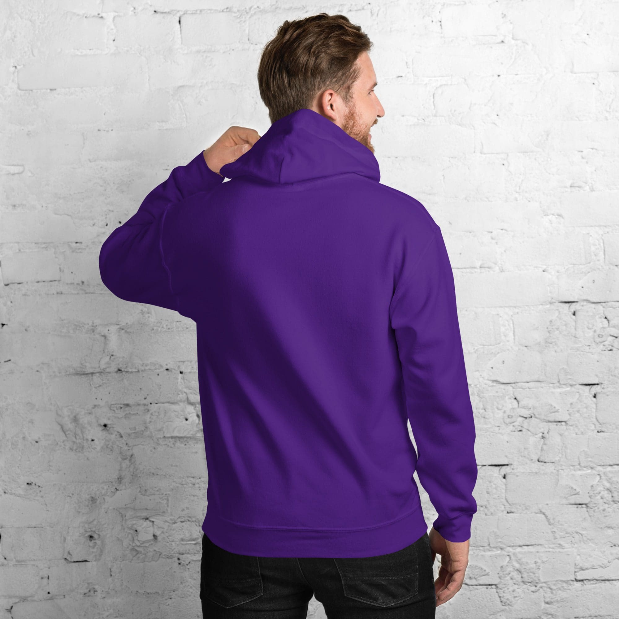 Man wearing purple hoodie, facing away.