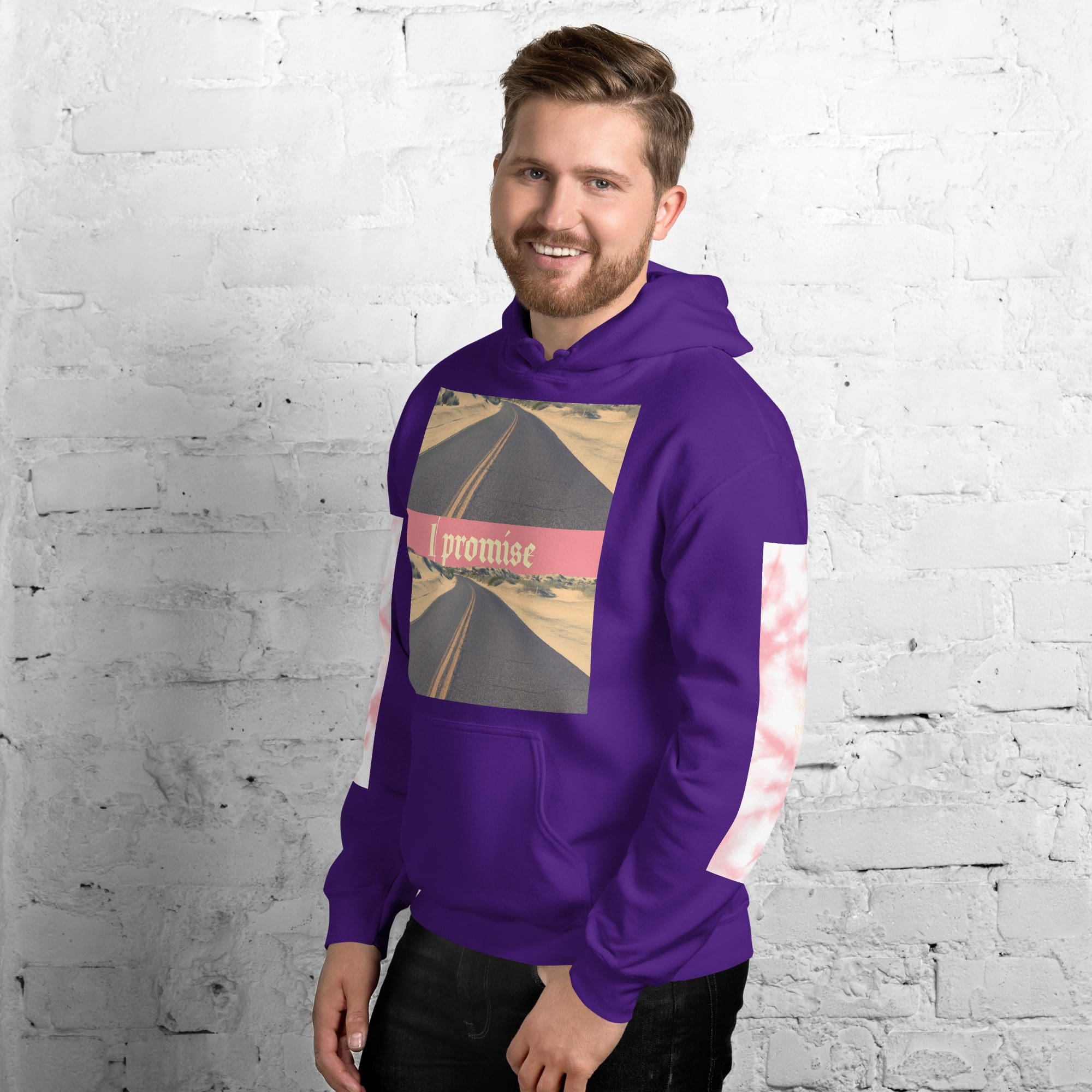 Bearded man in purple graphic hoodie