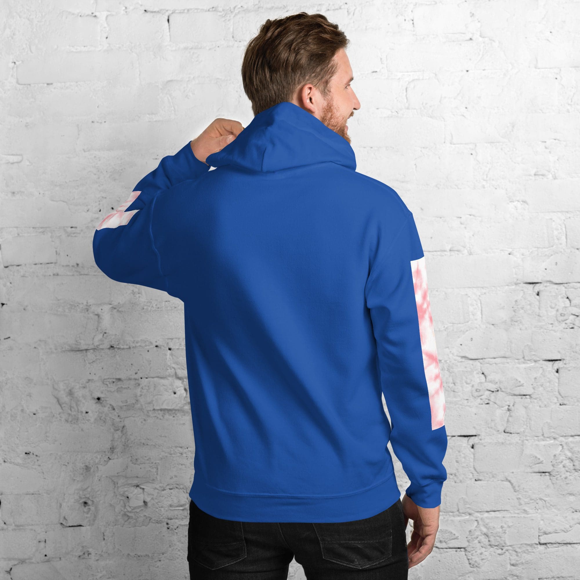 Man wearing blue hoodie, back view.