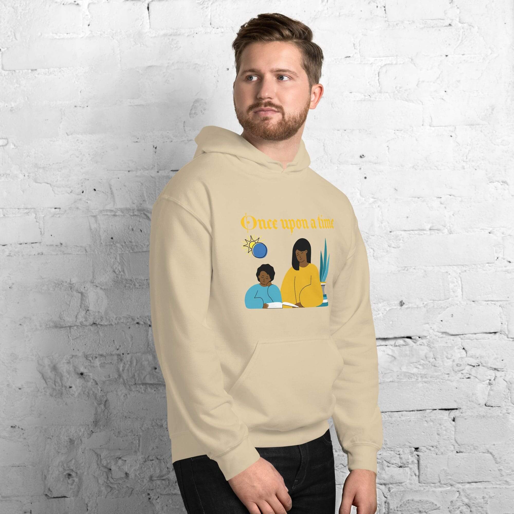 Man wearing illustrated beige hoodie.