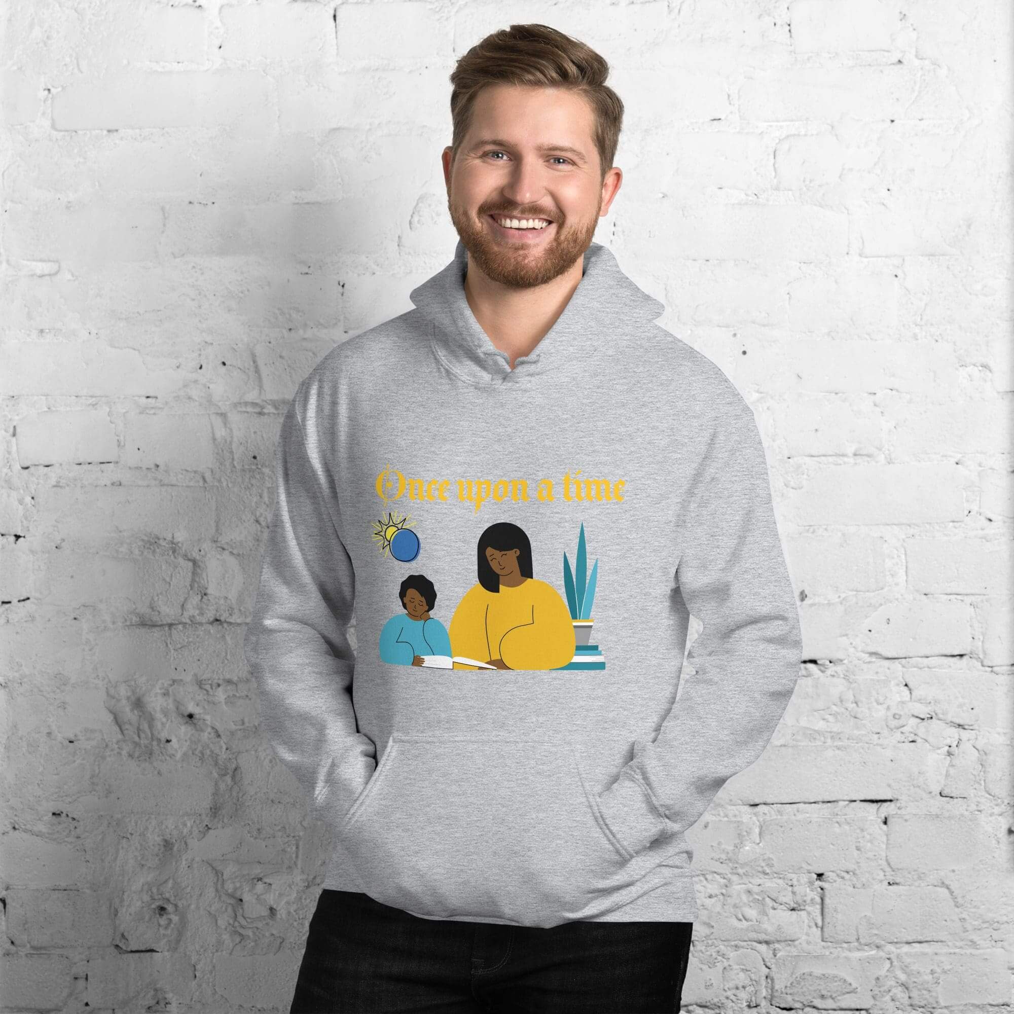 Smiling man wearing reading-themed hoodie