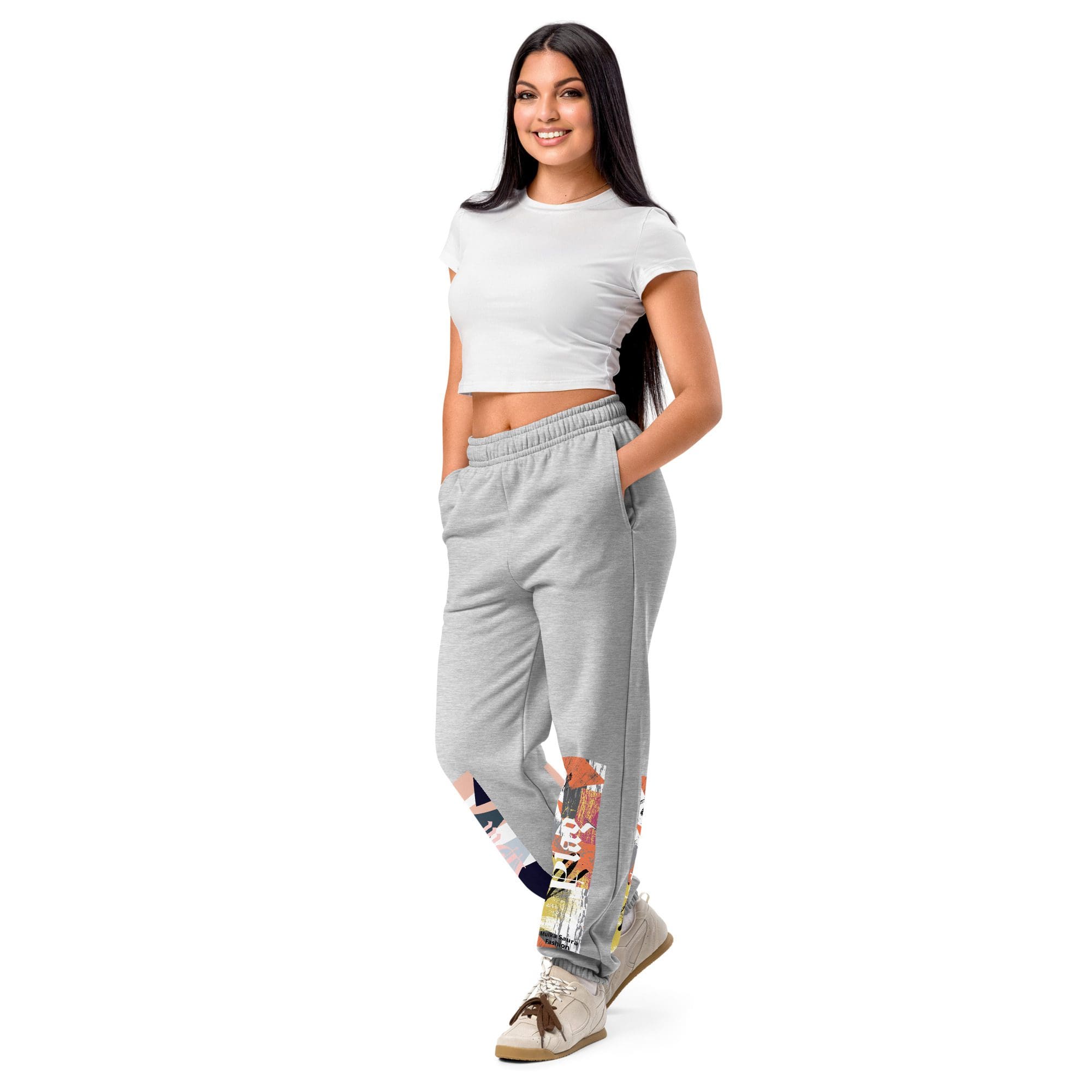 Woman in casual outfit, hands in pockets.