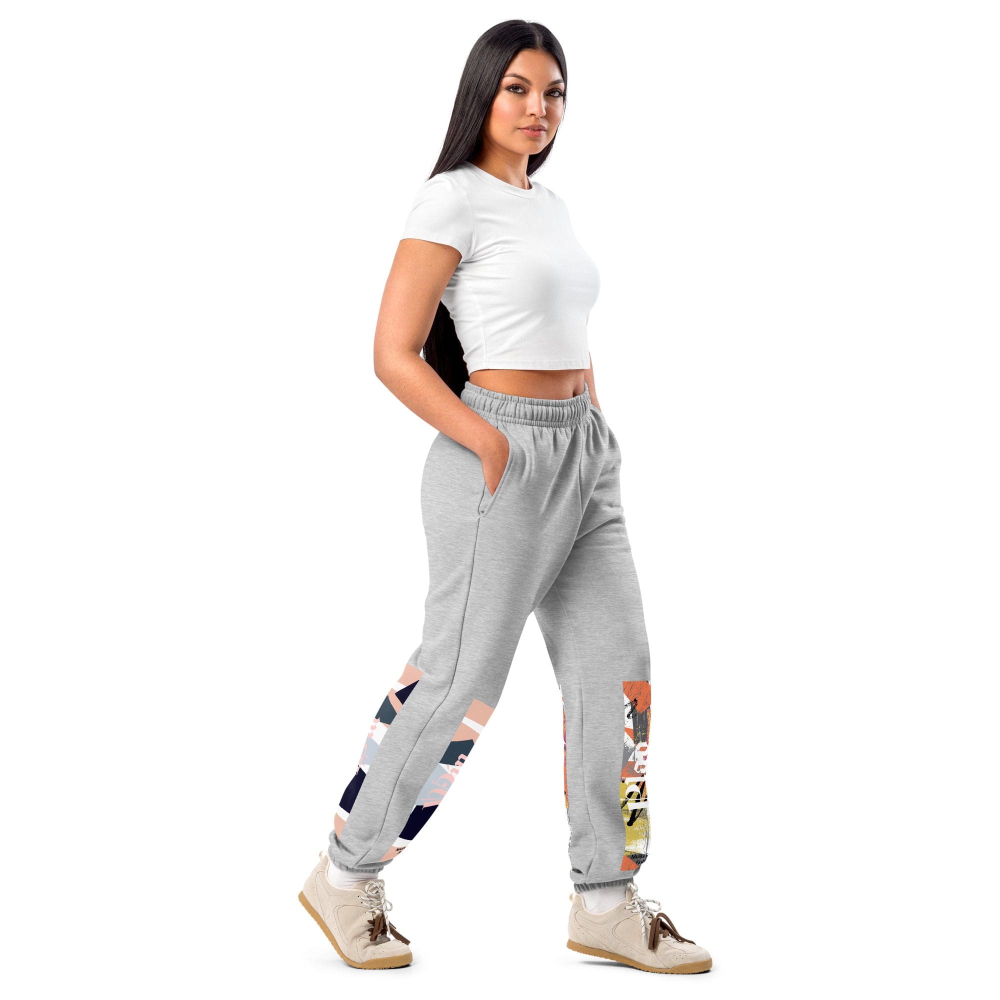 Woman in white top and gray joggers.