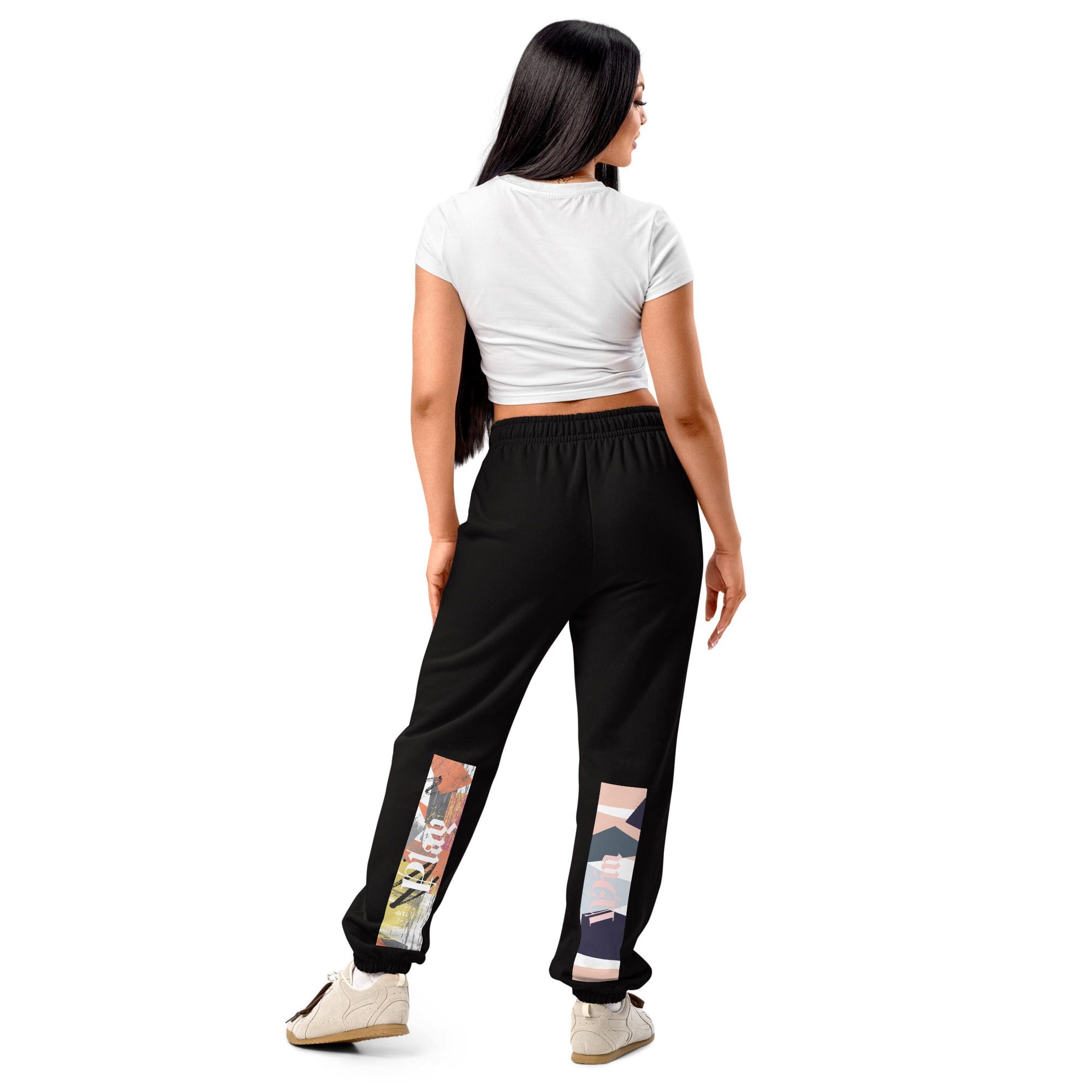 Woman in casual outfit, colorful pants design.