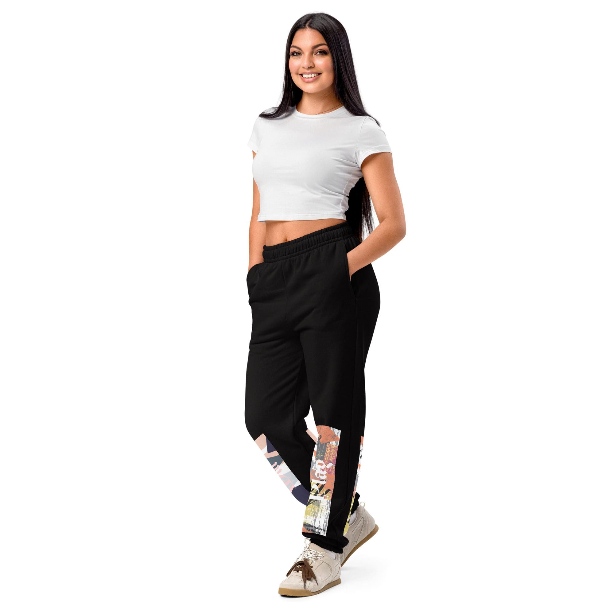 Smiling woman in white crop top and joggers