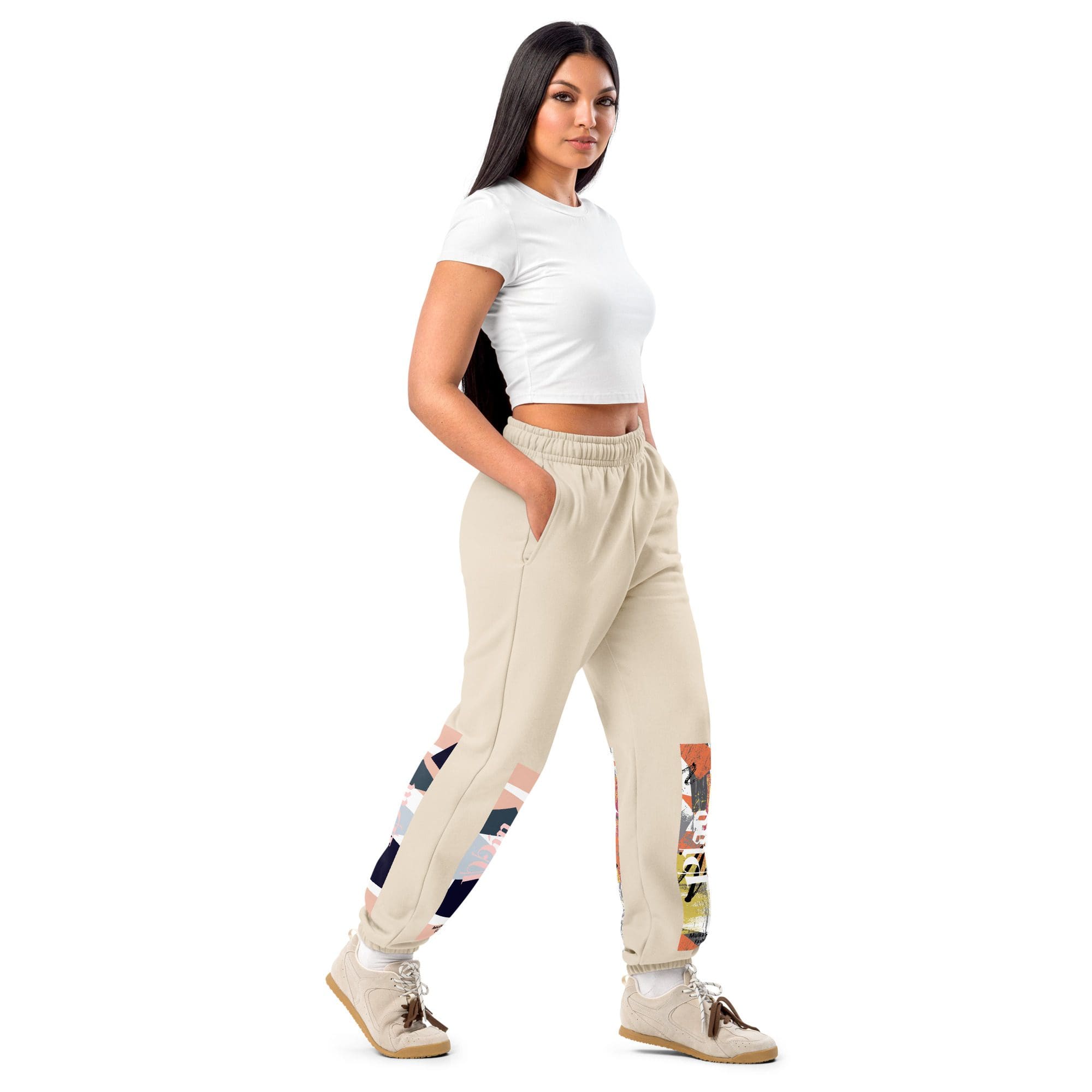 Woman in white top and beige joggers.