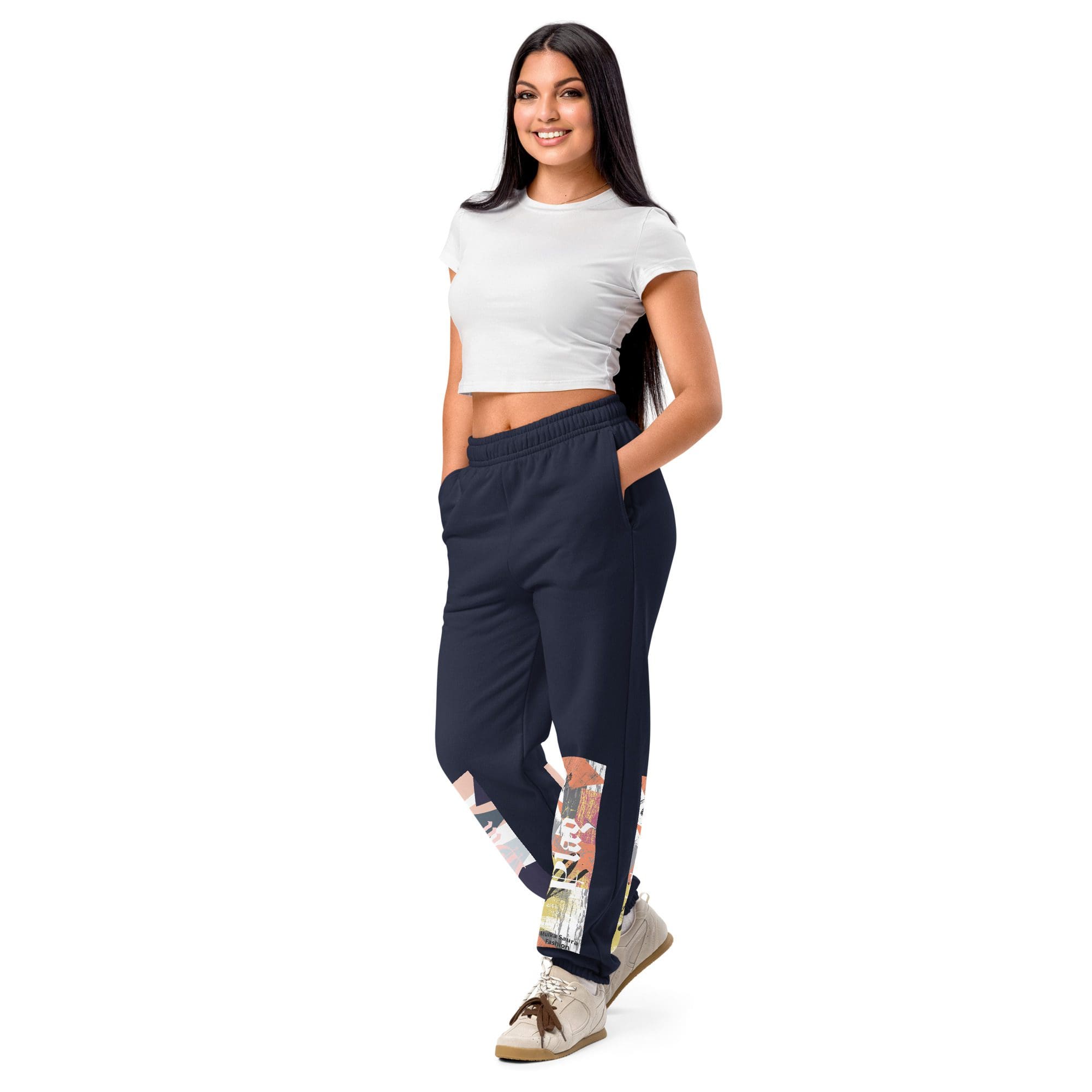 Woman in casual outfit posing confidently.