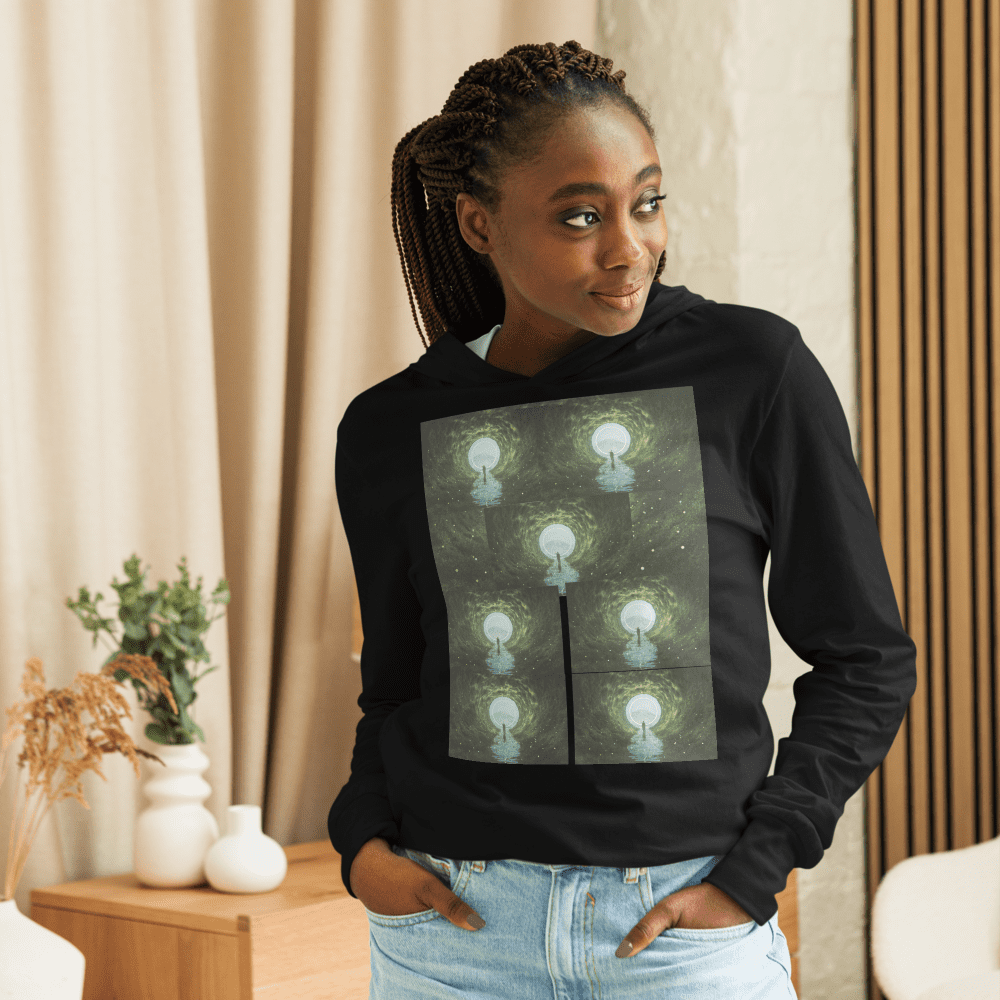 Woman wearing black shirt with tree design.