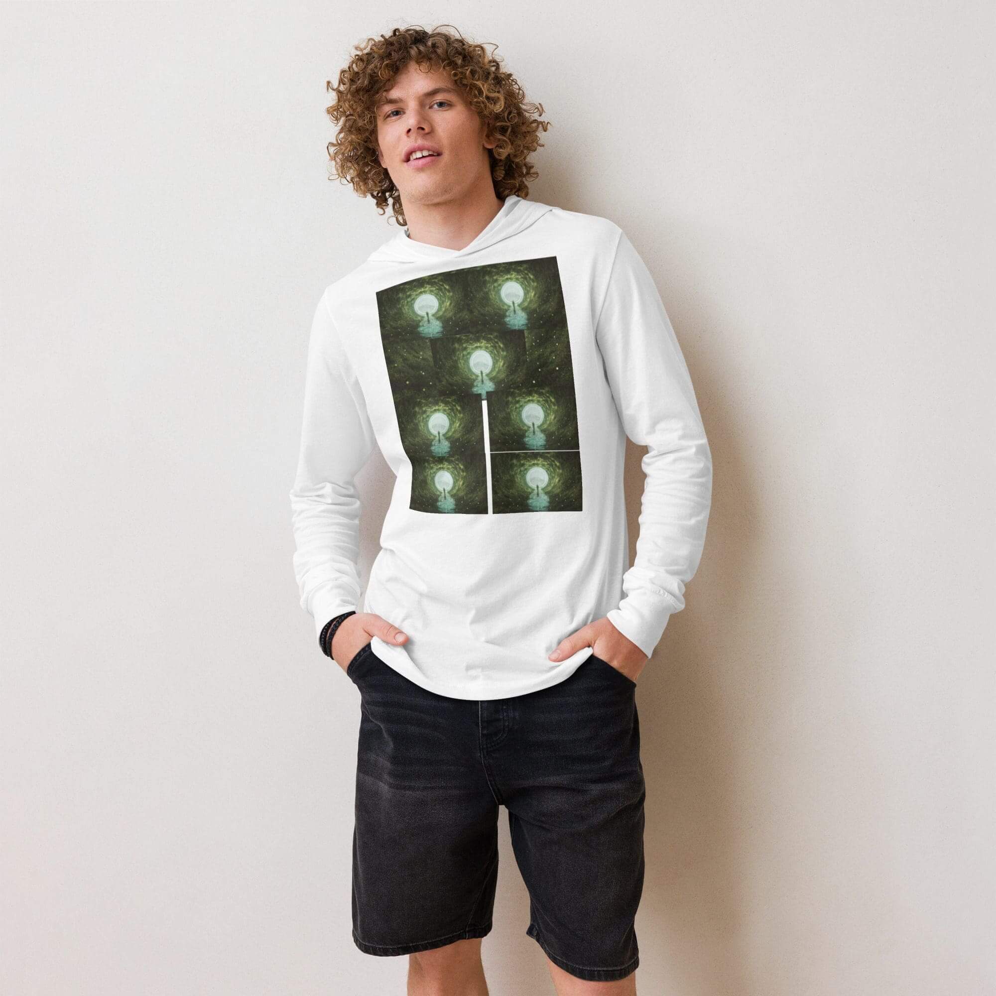 Young man in graphic hoodie and shorts.