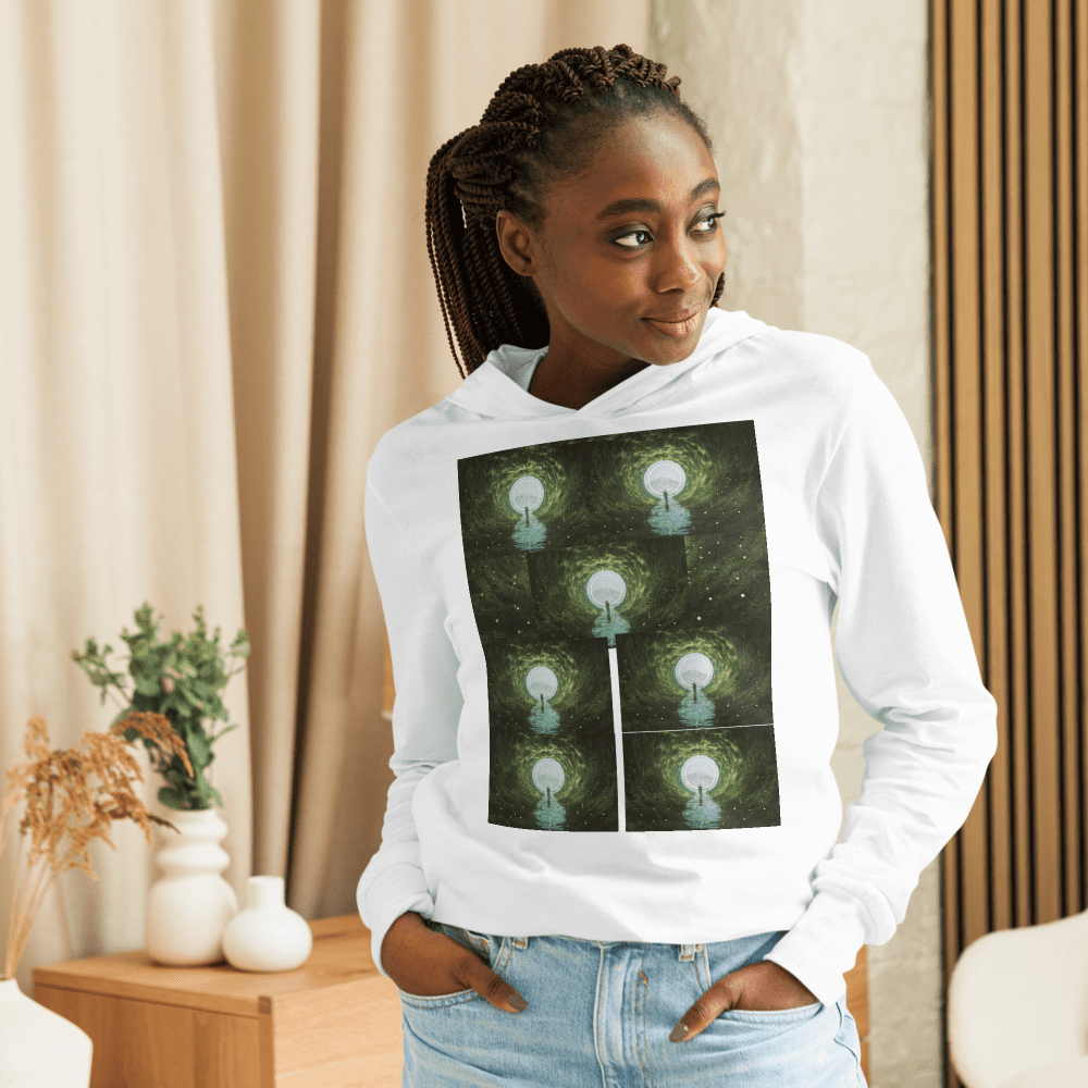 Woman wearing hoodie with abstract design.