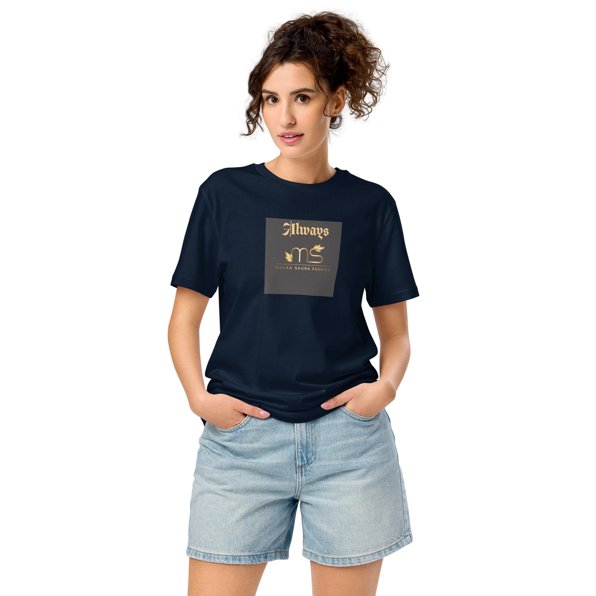 Woman wearing black t-shirt and denim shorts.