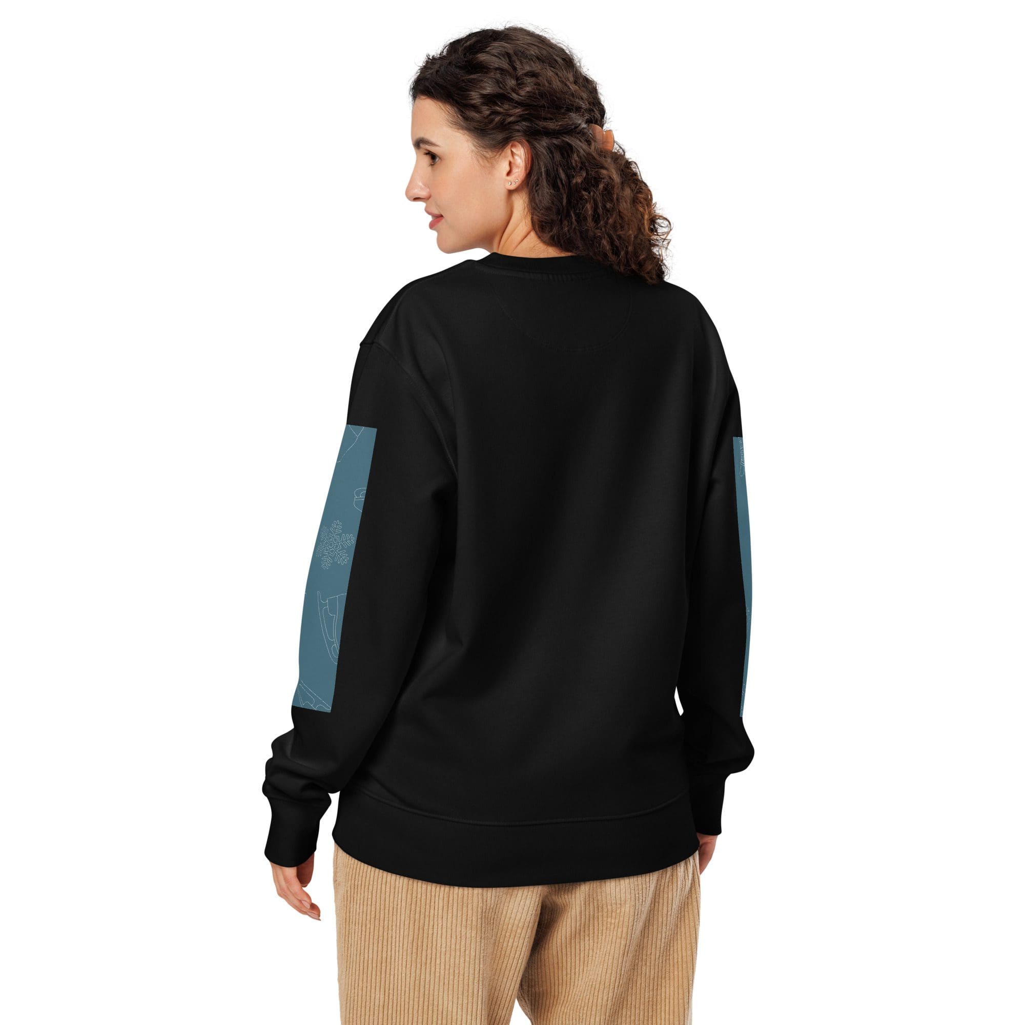 Woman in black sweater facing sideways.