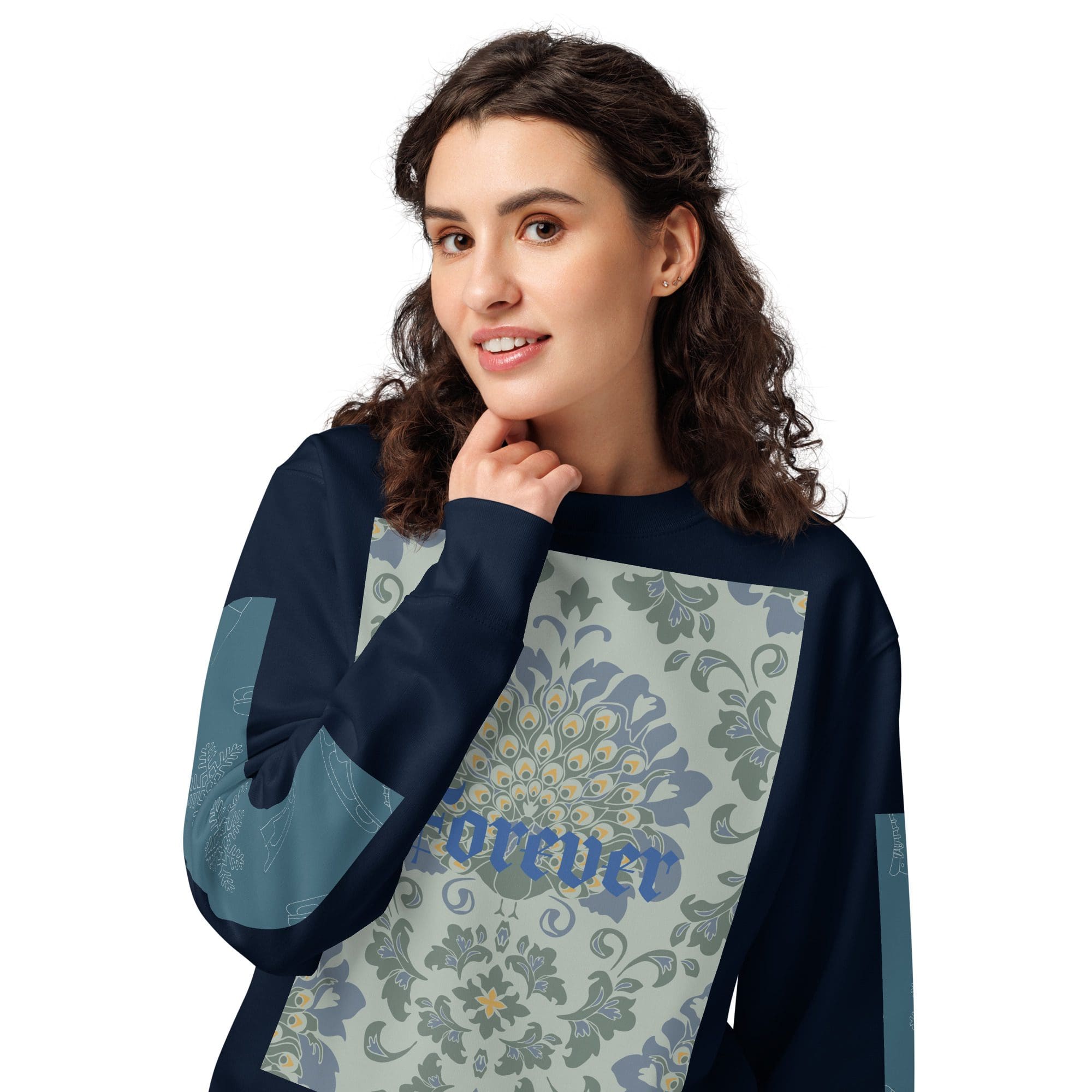 Woman in patterned blue sweatshirt smiling.