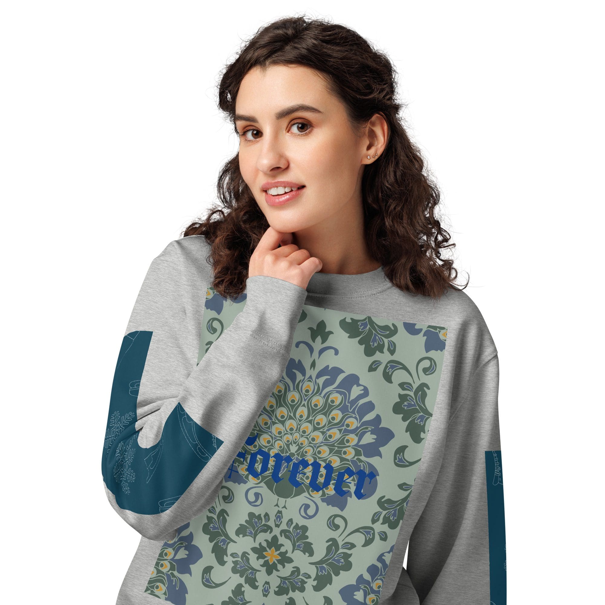 Woman wearing floral patterned gray sweatshirt.