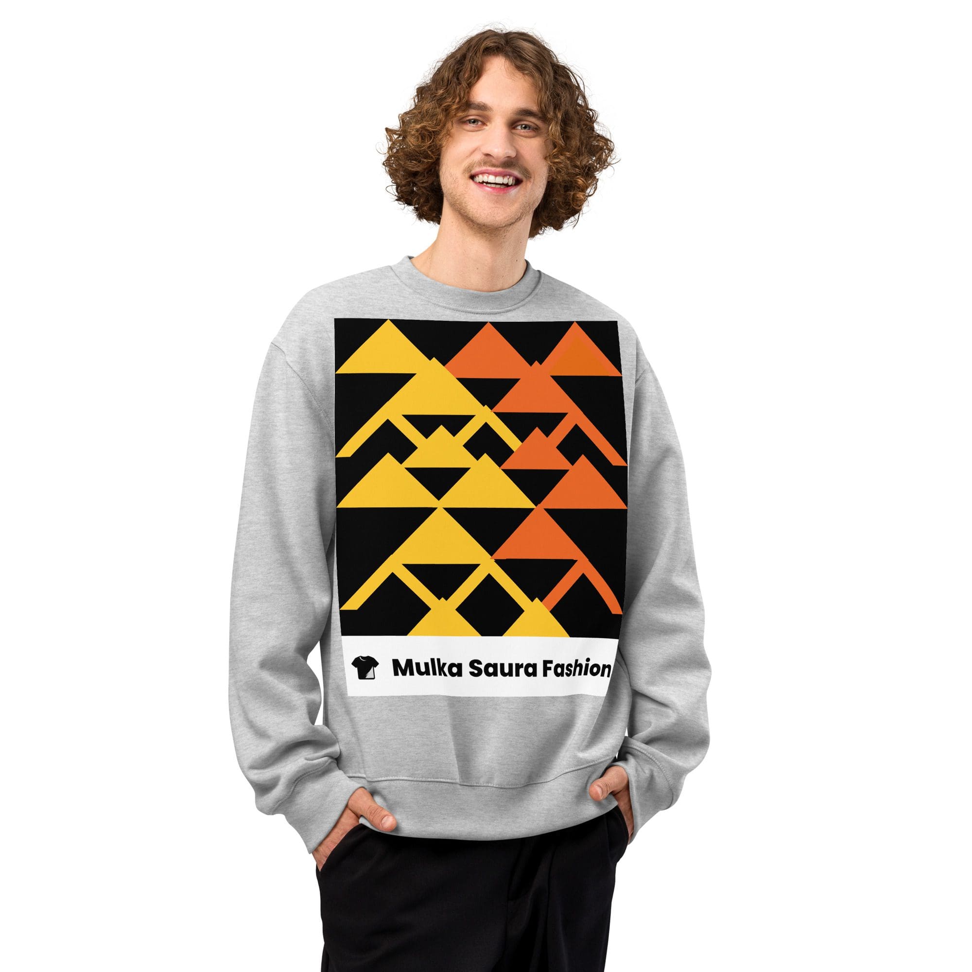 Smiling man wearing geometric orange-yellow sweatshirt