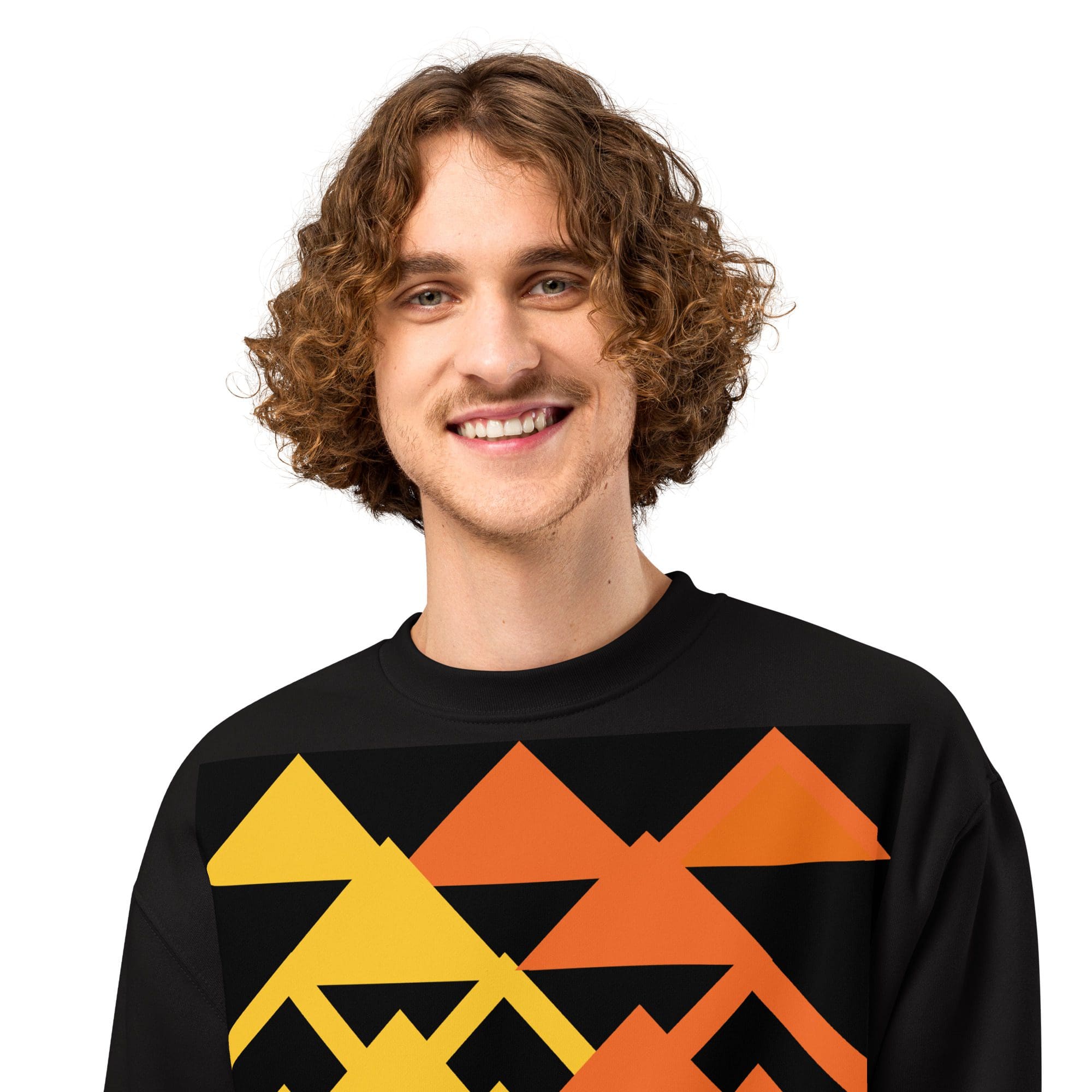 Smiling person wearing geometric-patterned sweatshirt.