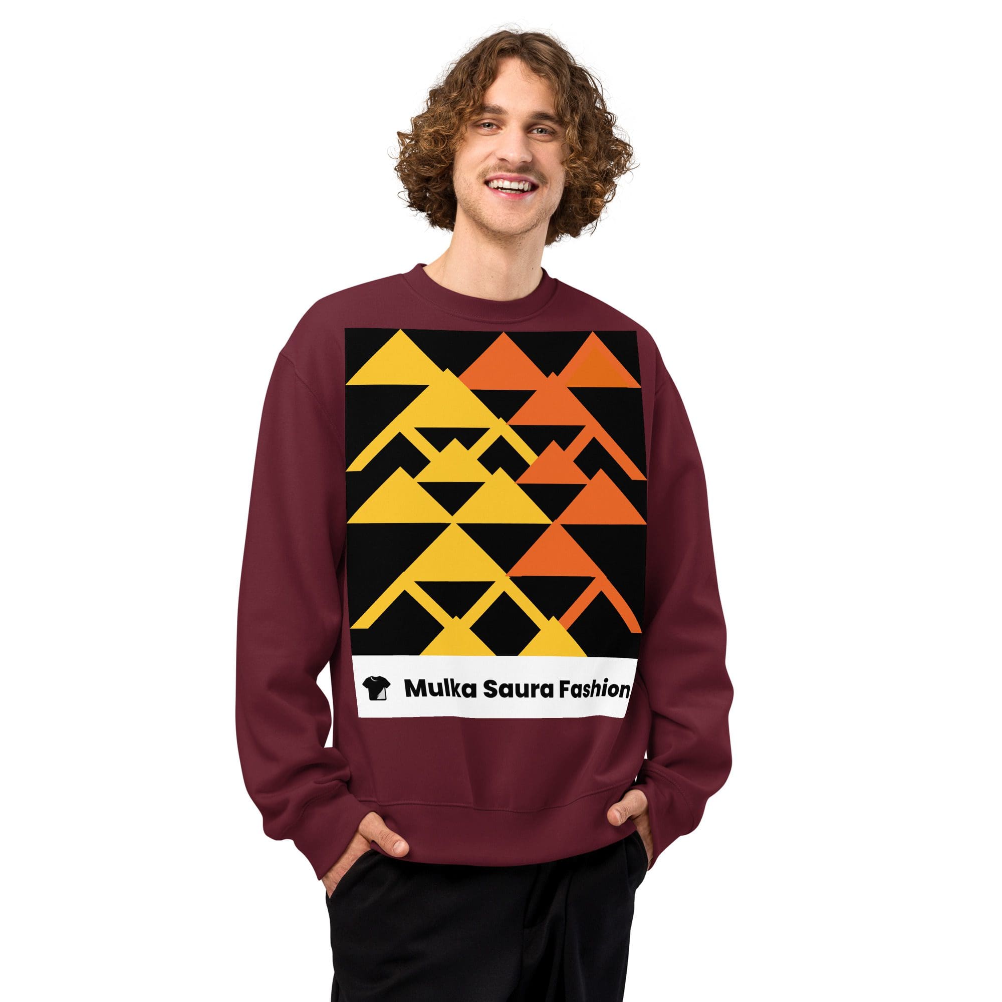 Smiling person in geometric patterned sweatshirt.