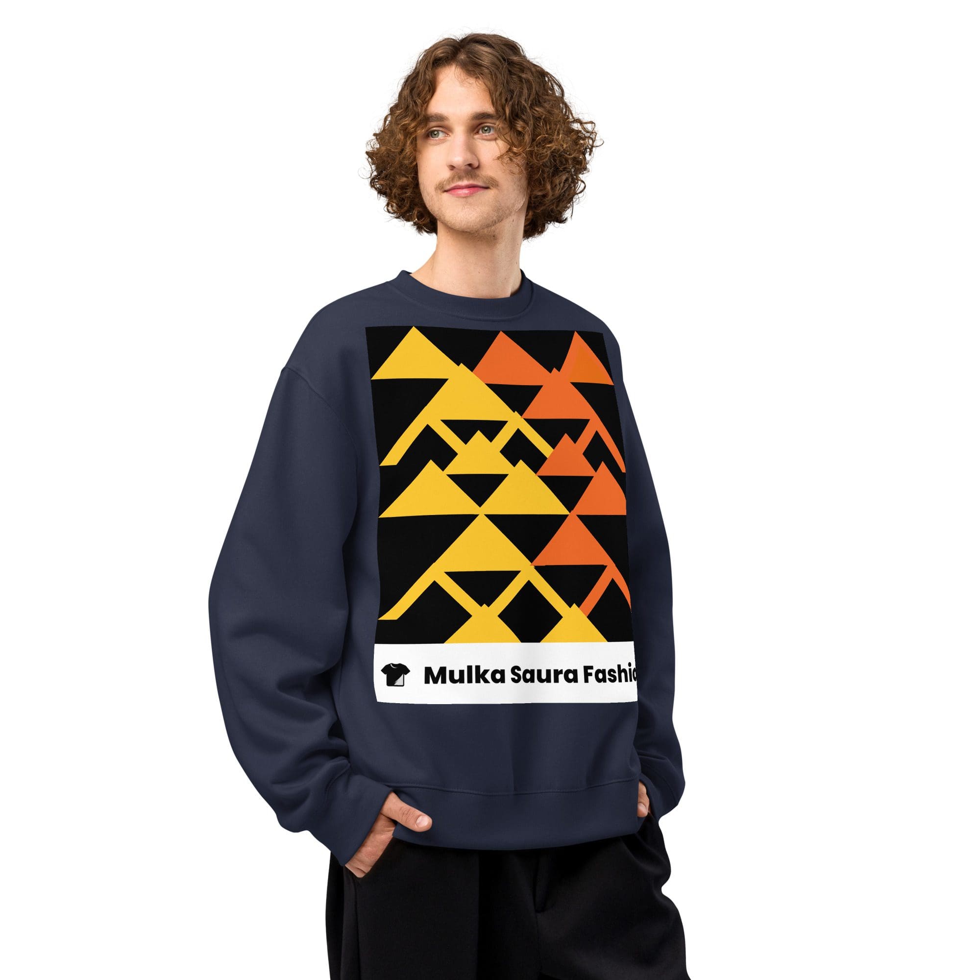 Man wearing geometric patterned sweatshirt, smiling.