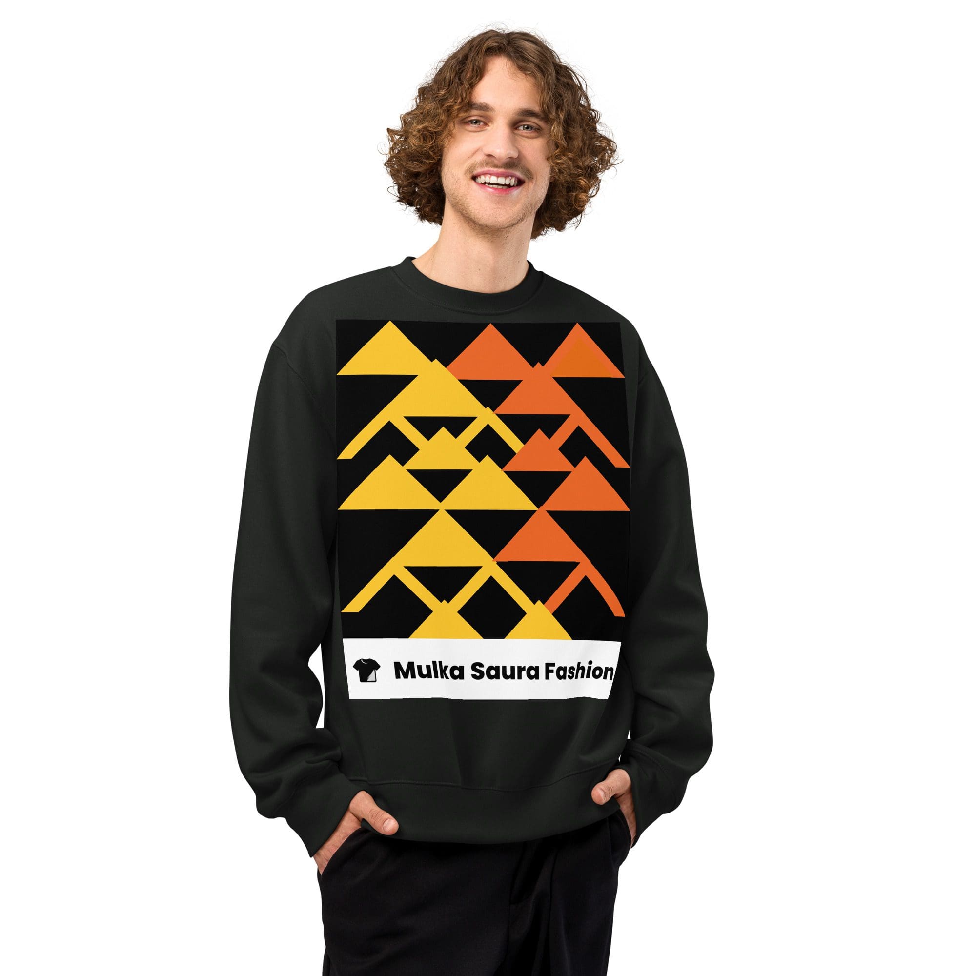 Man in geometric-patterned sweatshirt smiling.