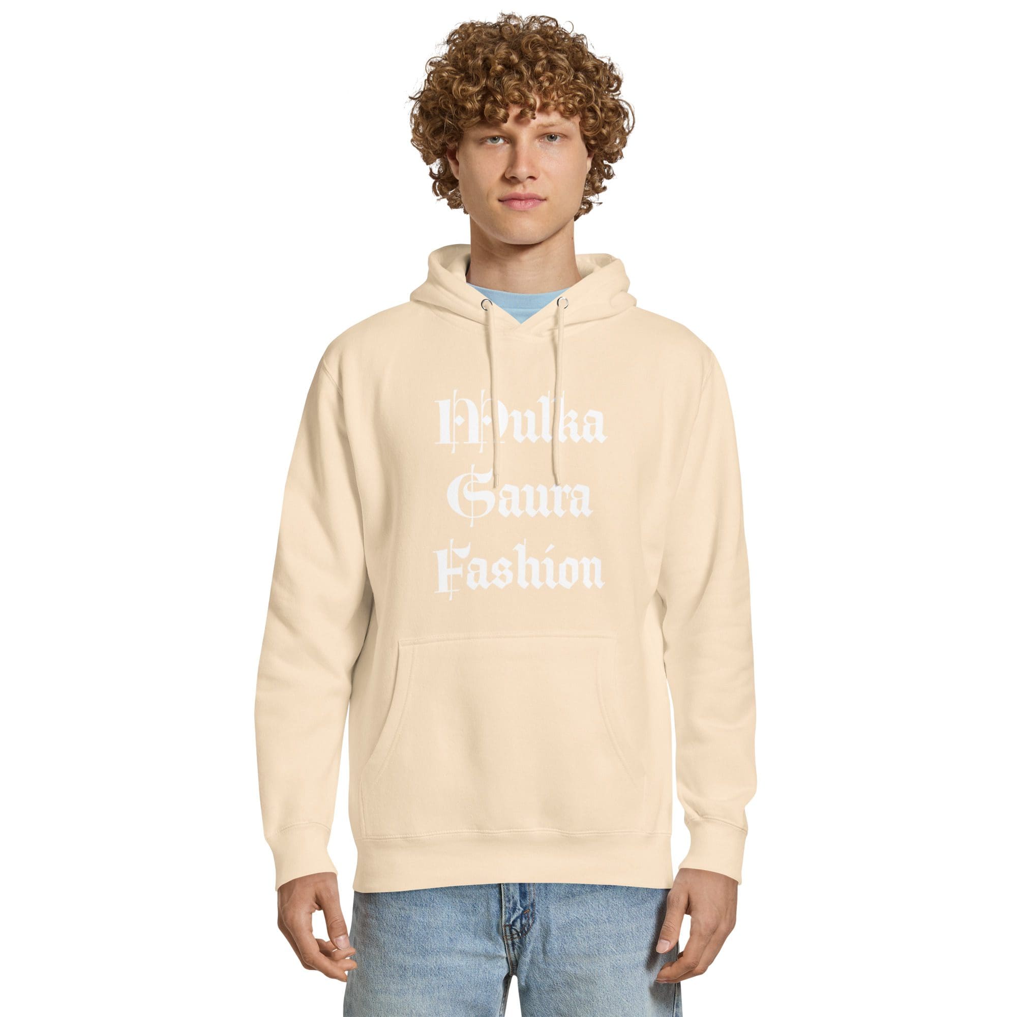 Man wearing beige hoodie and jeans.