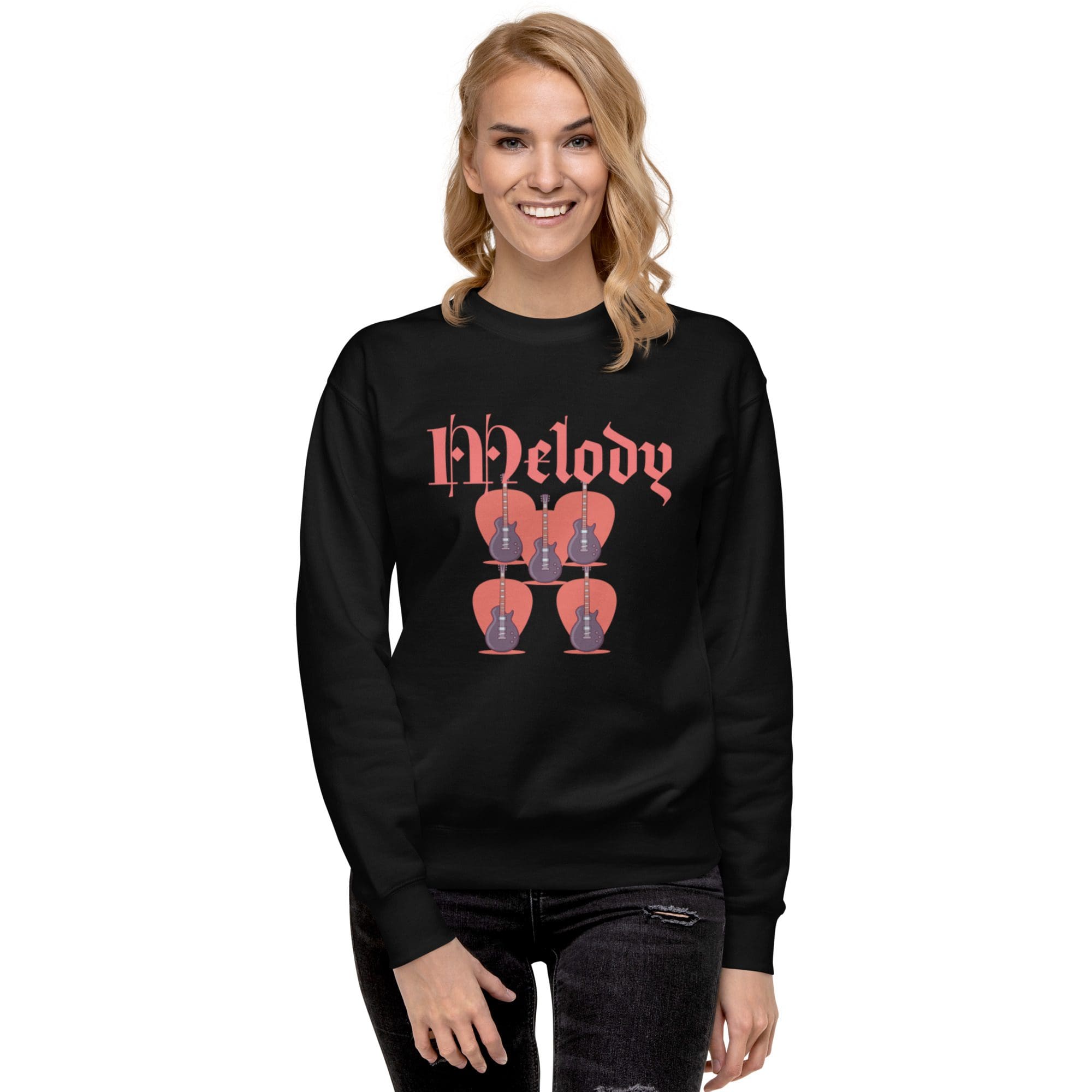 Woman wearing a black "Melody" sweater.