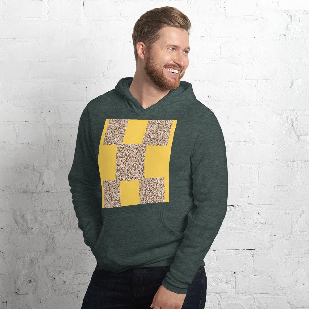Man wearing a green hoodie, smiling.