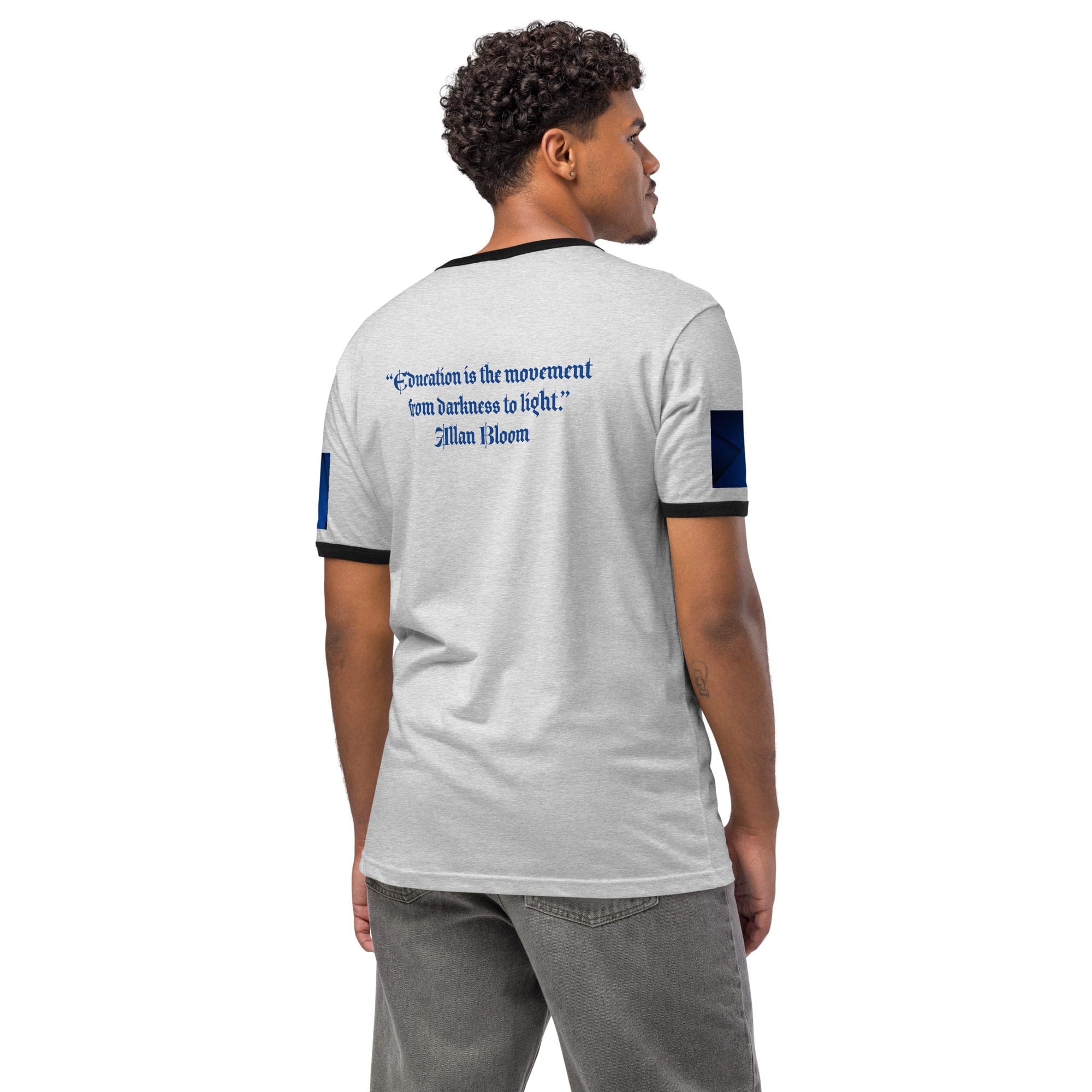 Man wearing a shirt with printed quote.