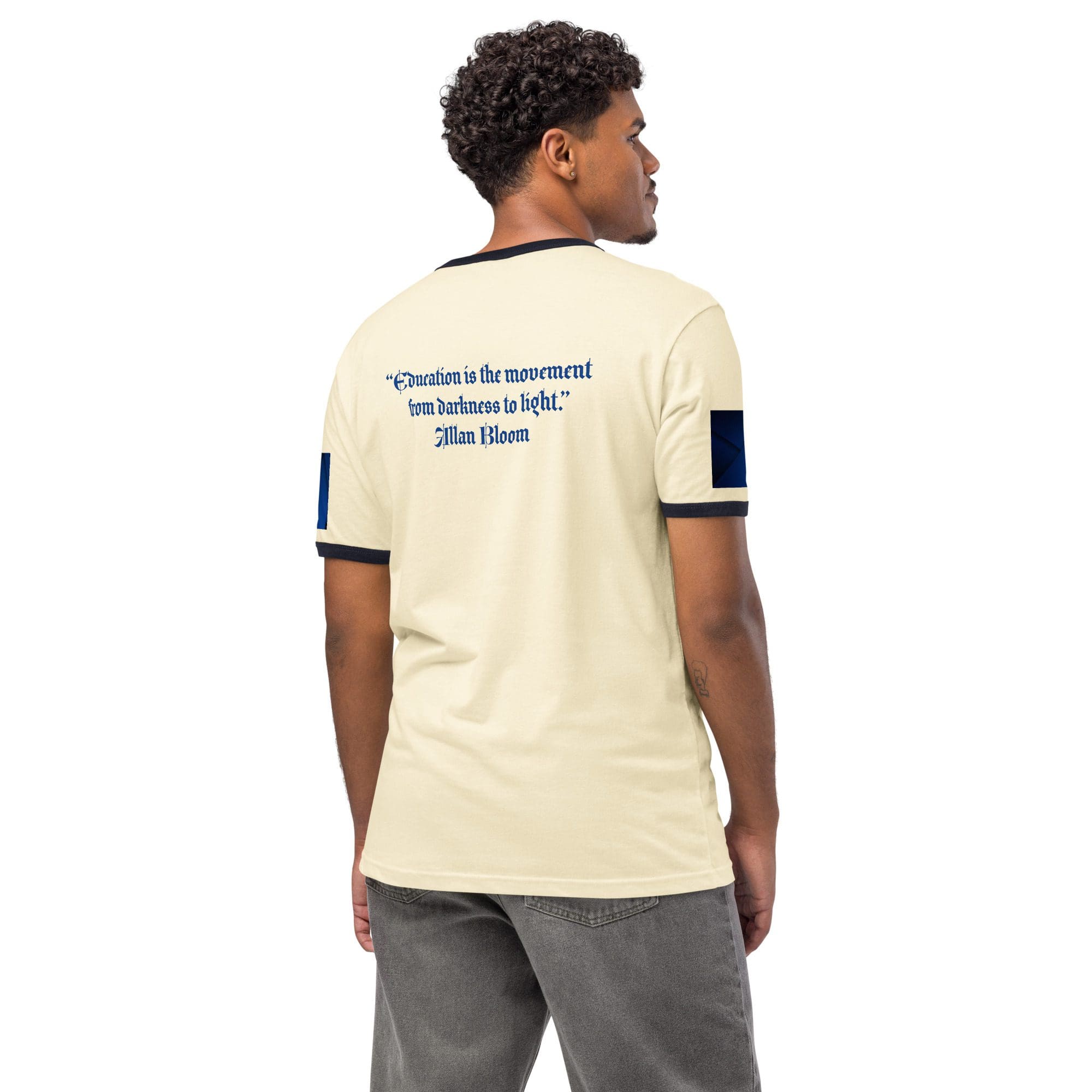Man wearing shirt with printed quote.
