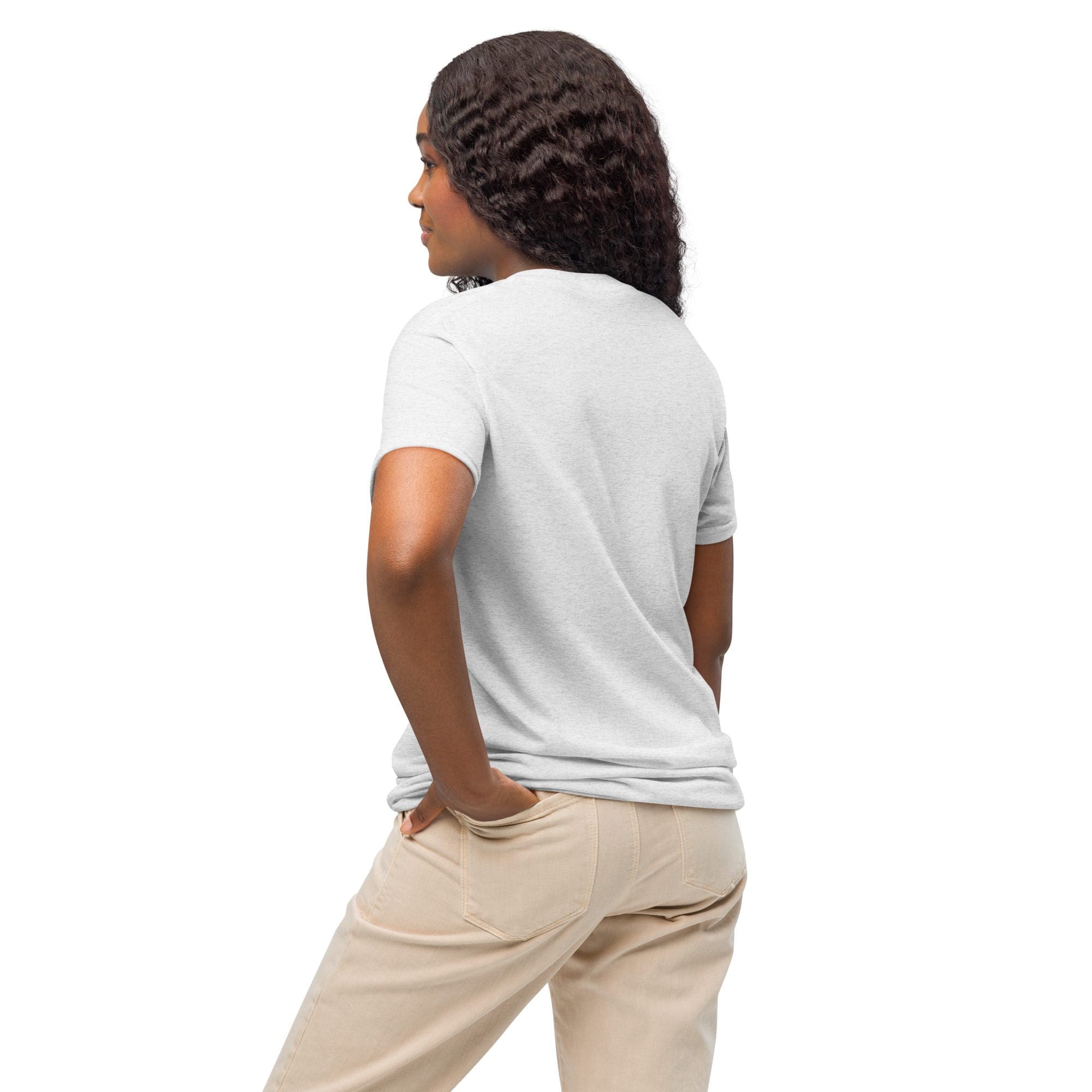 Woman wearing white t-shirt and beige pants.