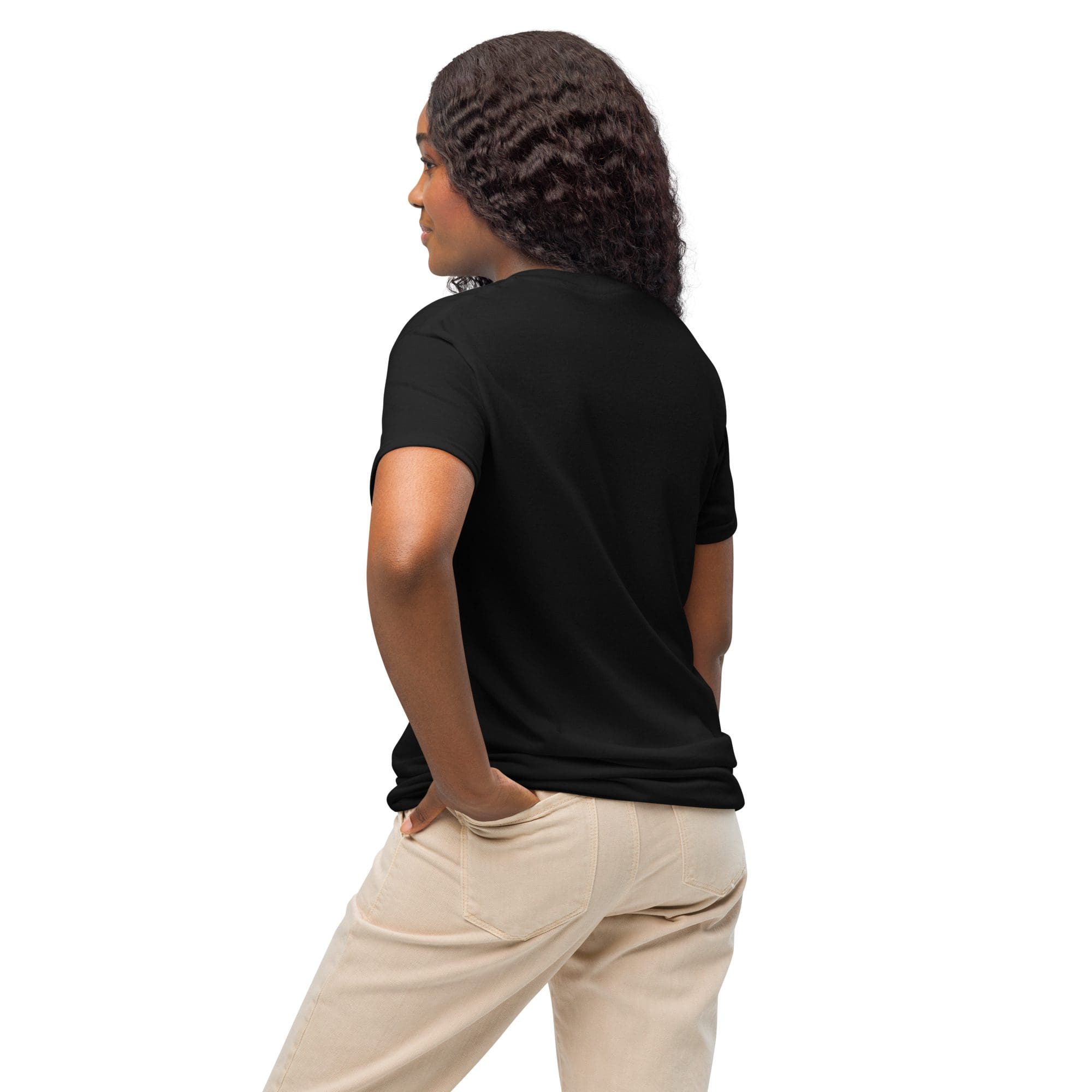 Woman wearing black shirt and beige pants.
