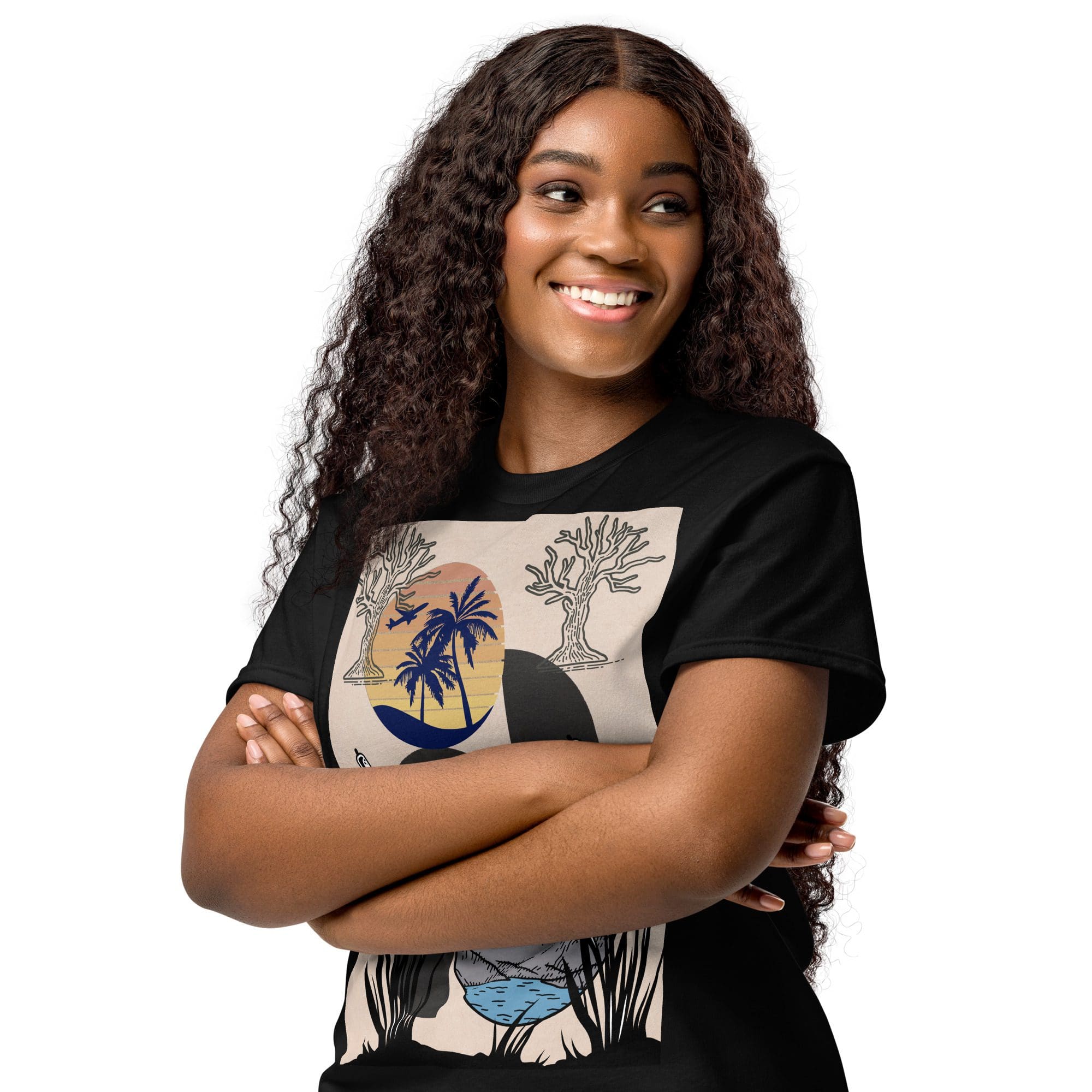 Smiling woman in graphic t-shirt, arms crossed.