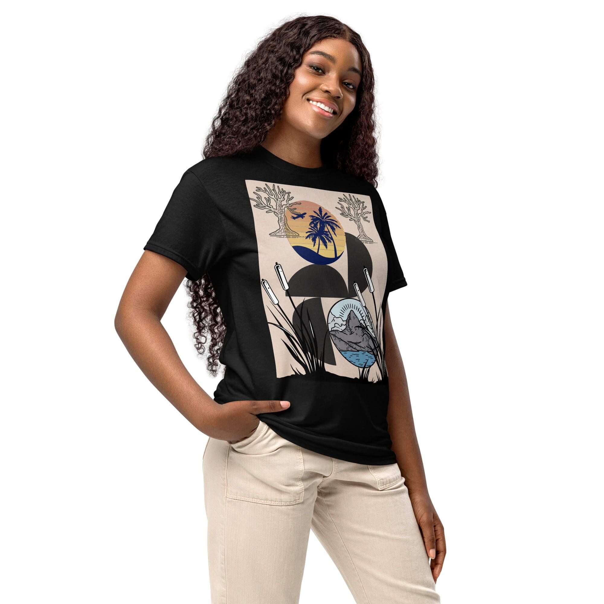 Smiling woman in graphic t-shirt.