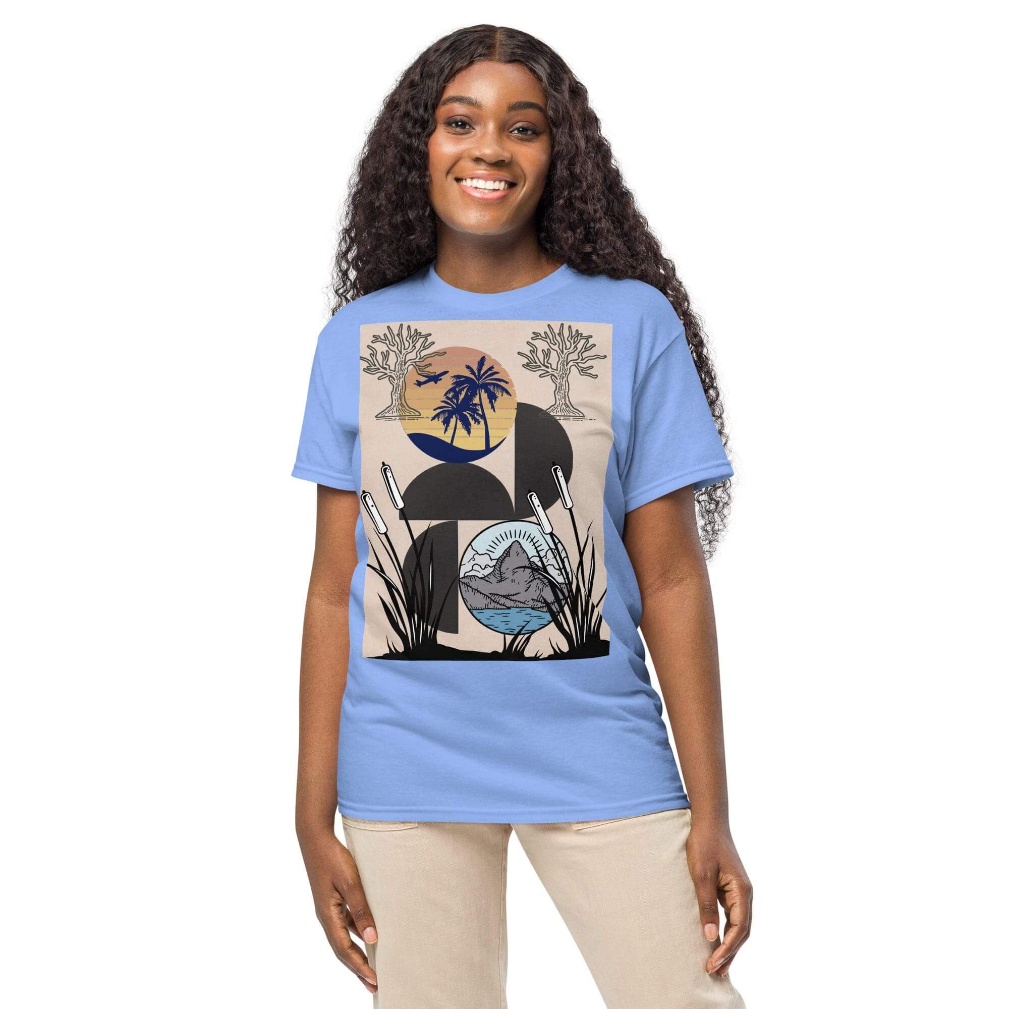 Smiling woman in blue graphic t-shirt.