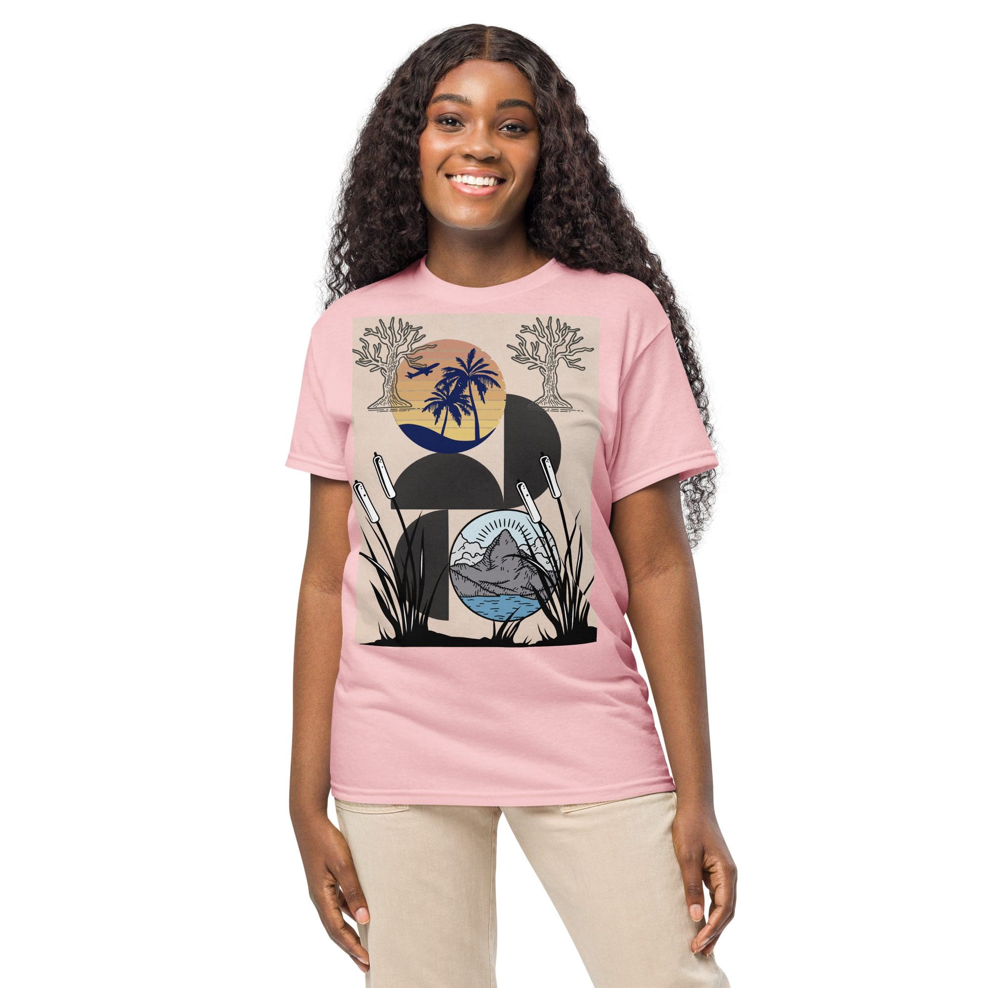 Woman in pink graphic T-shirt smiling.