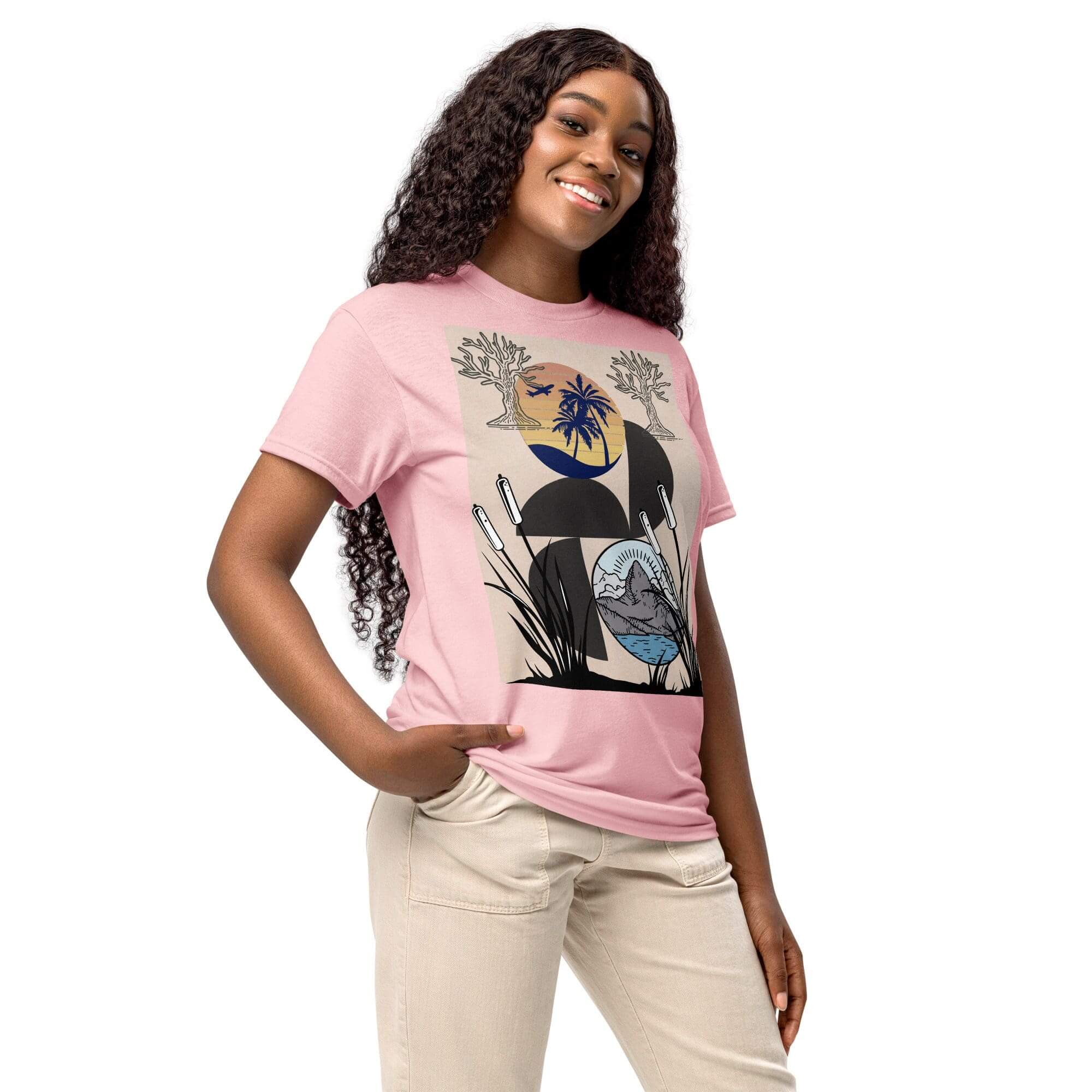 Smiling person wearing a graphic pink shirt.