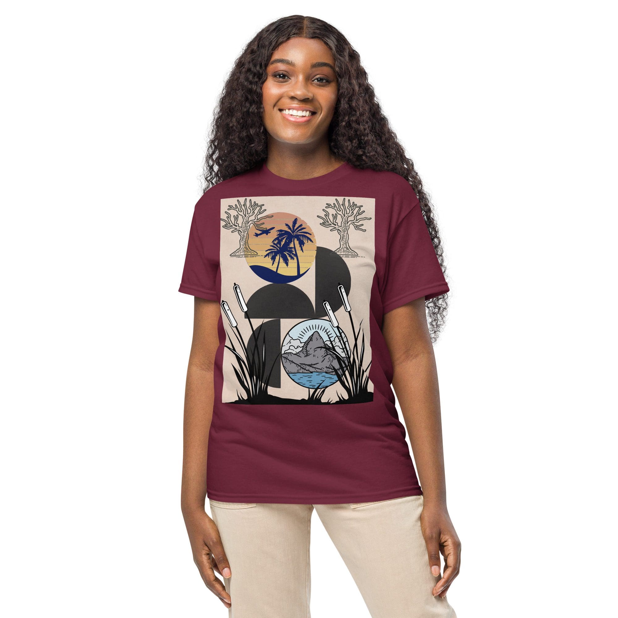 Woman wearing maroon graphic t-shirt, smiling.