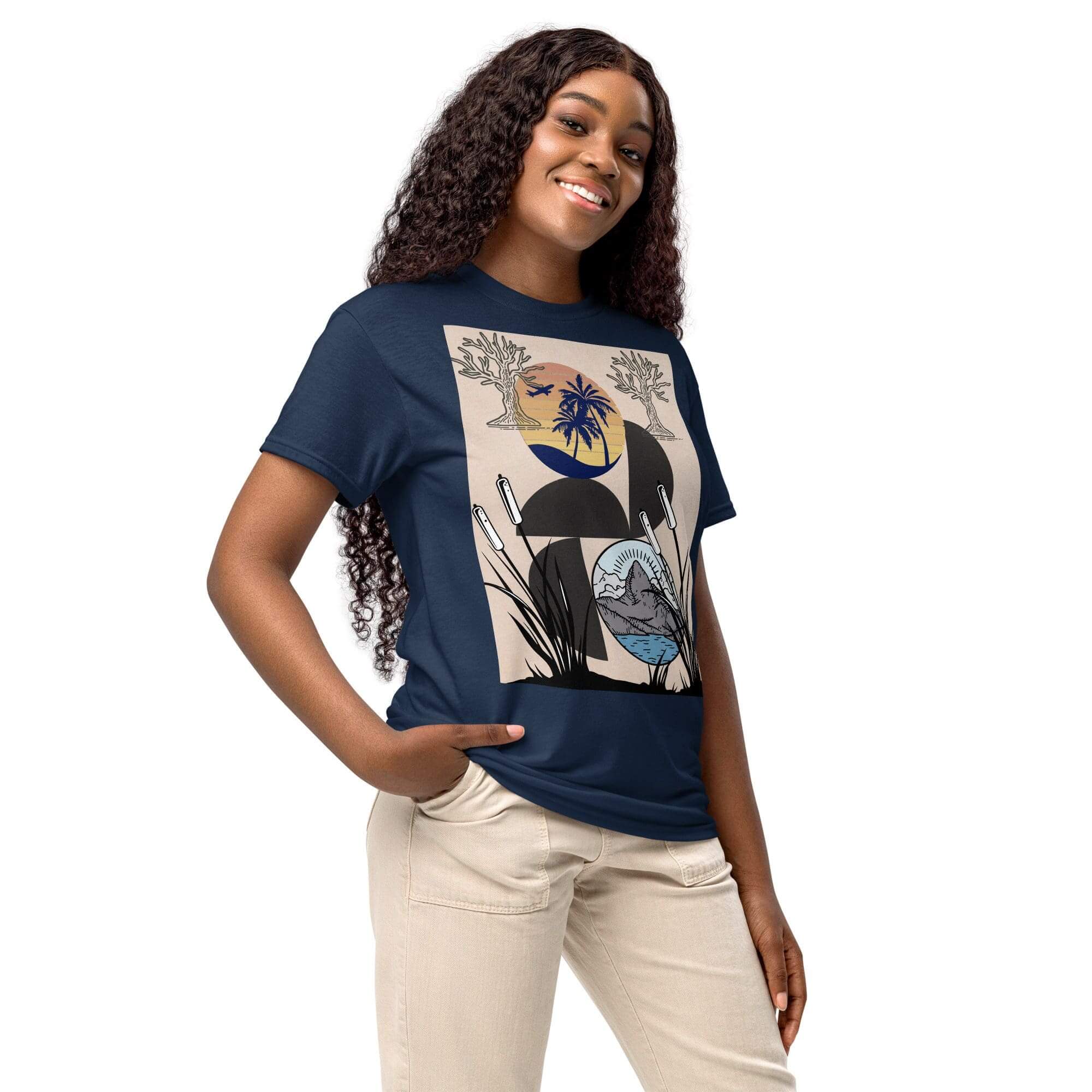 Smiling woman in graphic T-shirt and jeans.