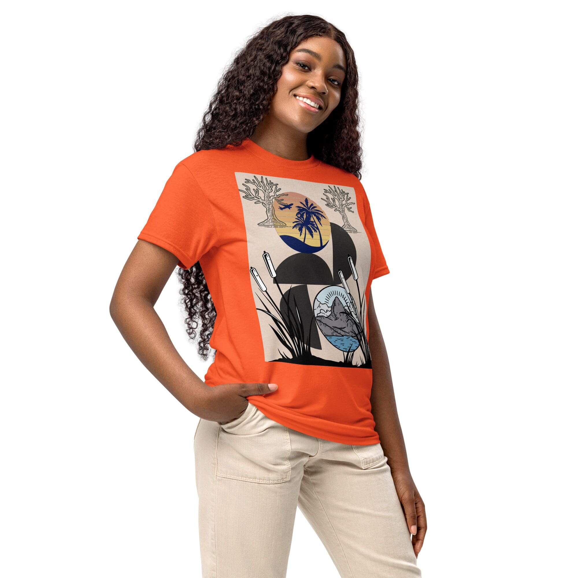 Smiling person in orange graphic t-shirt.