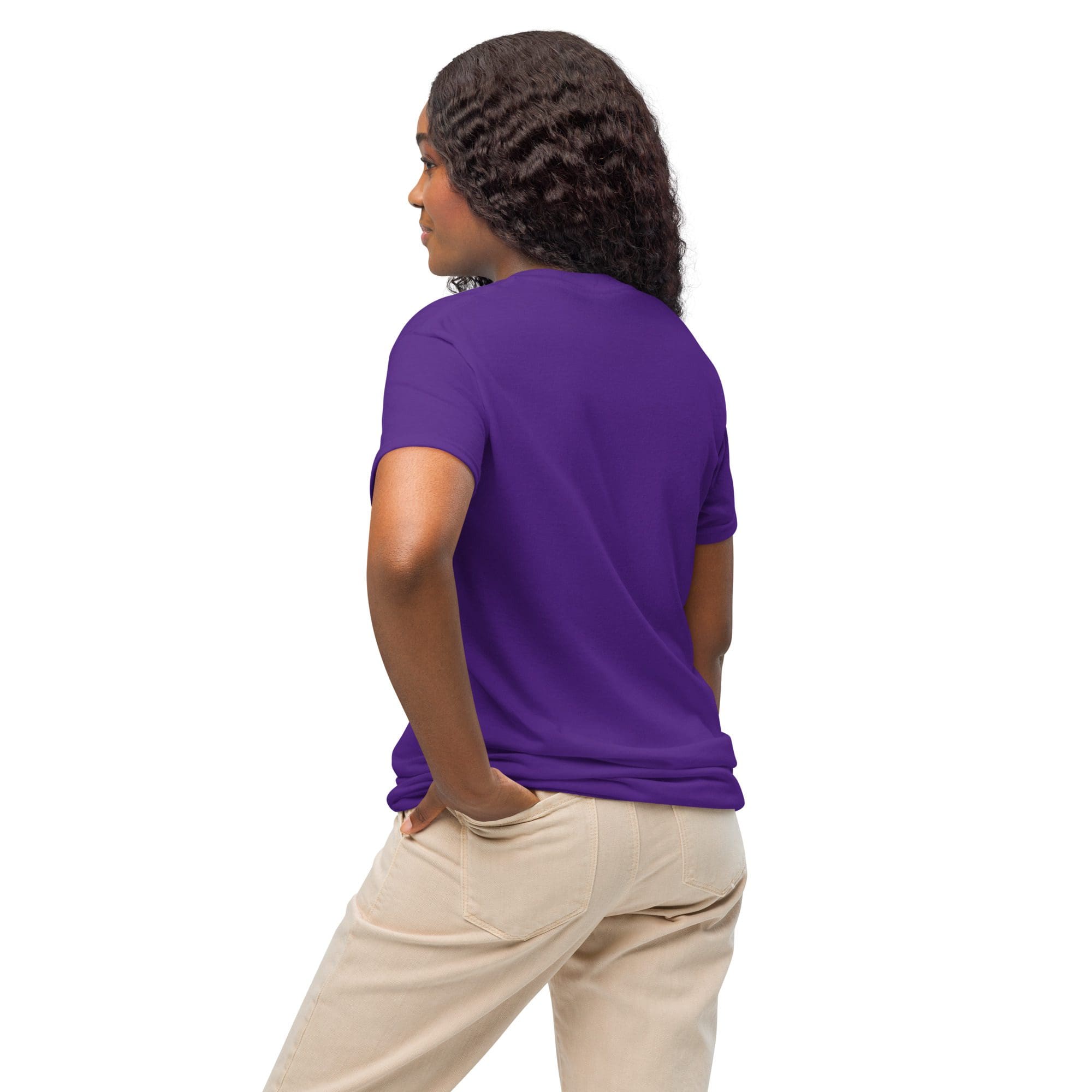 Person wearing purple shirt and beige pants.