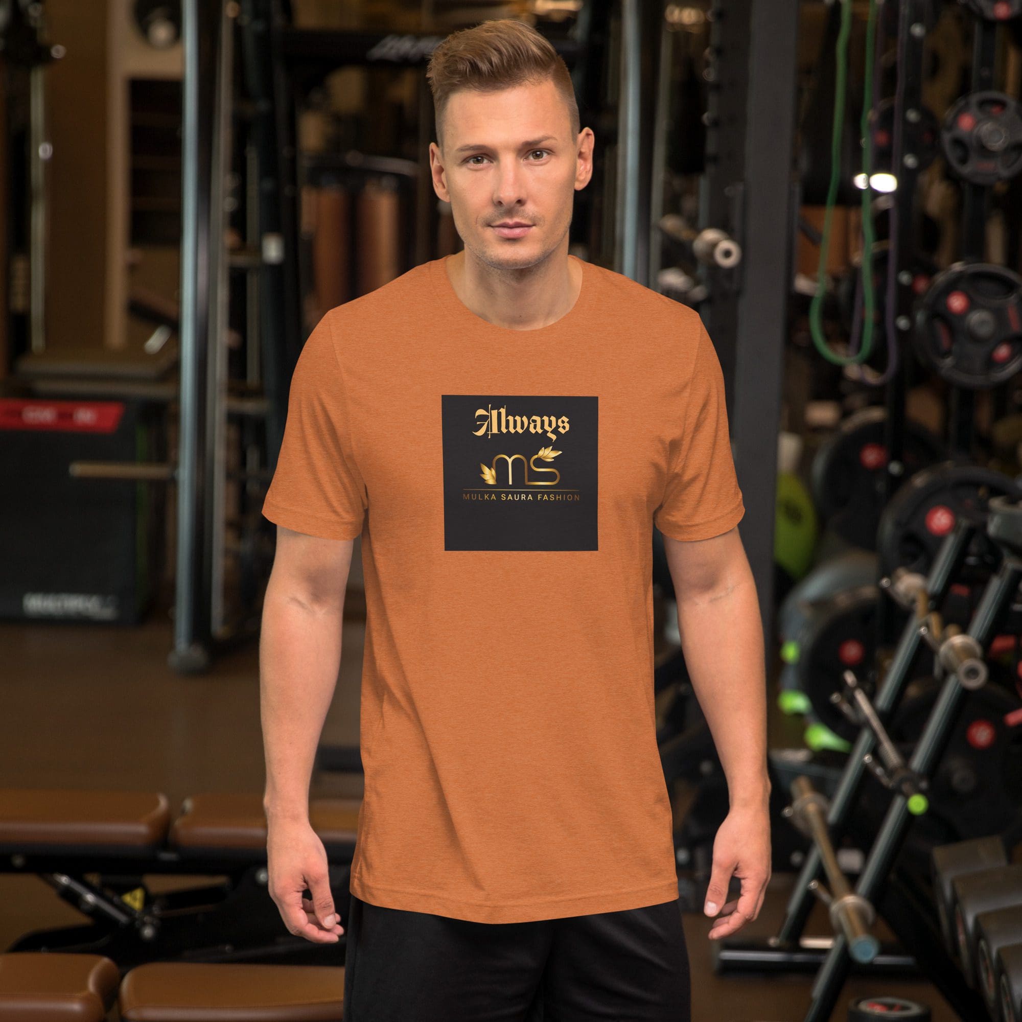 Man in gym wearing orange shirt.