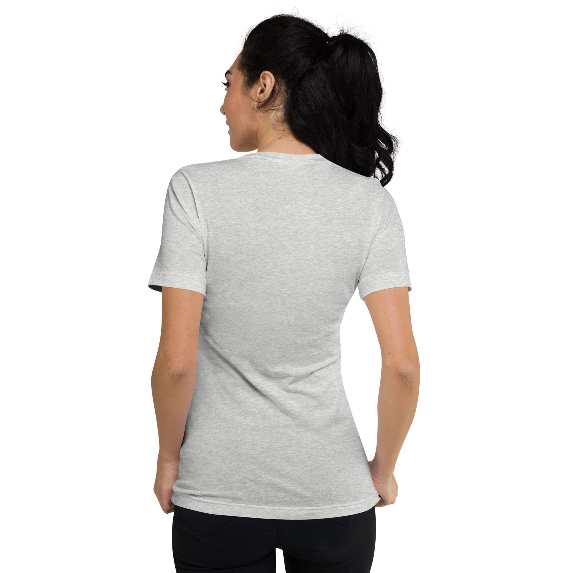 Woman in gray T-shirt facing away.