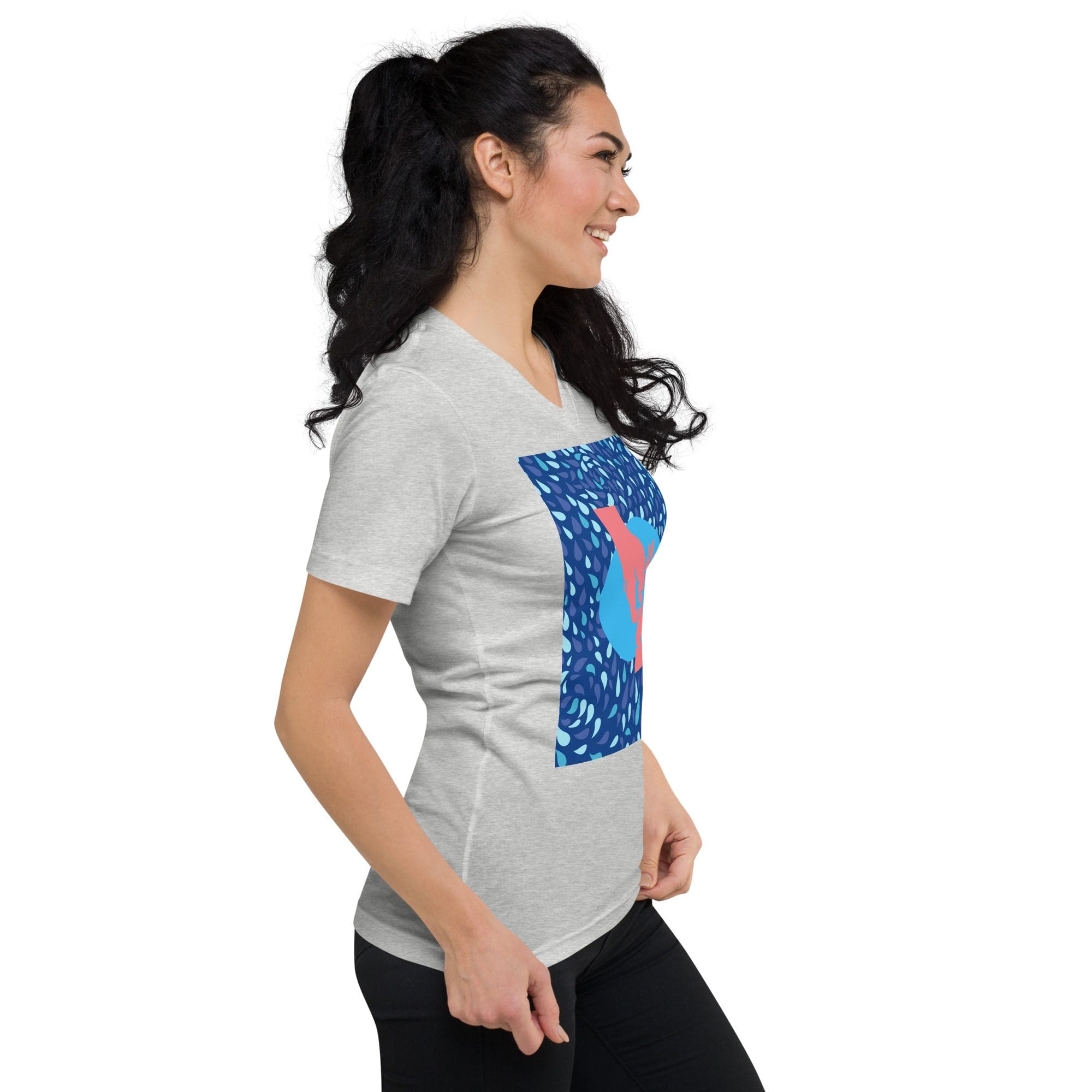 Side-profile woman modeling grey graphic t-shirt