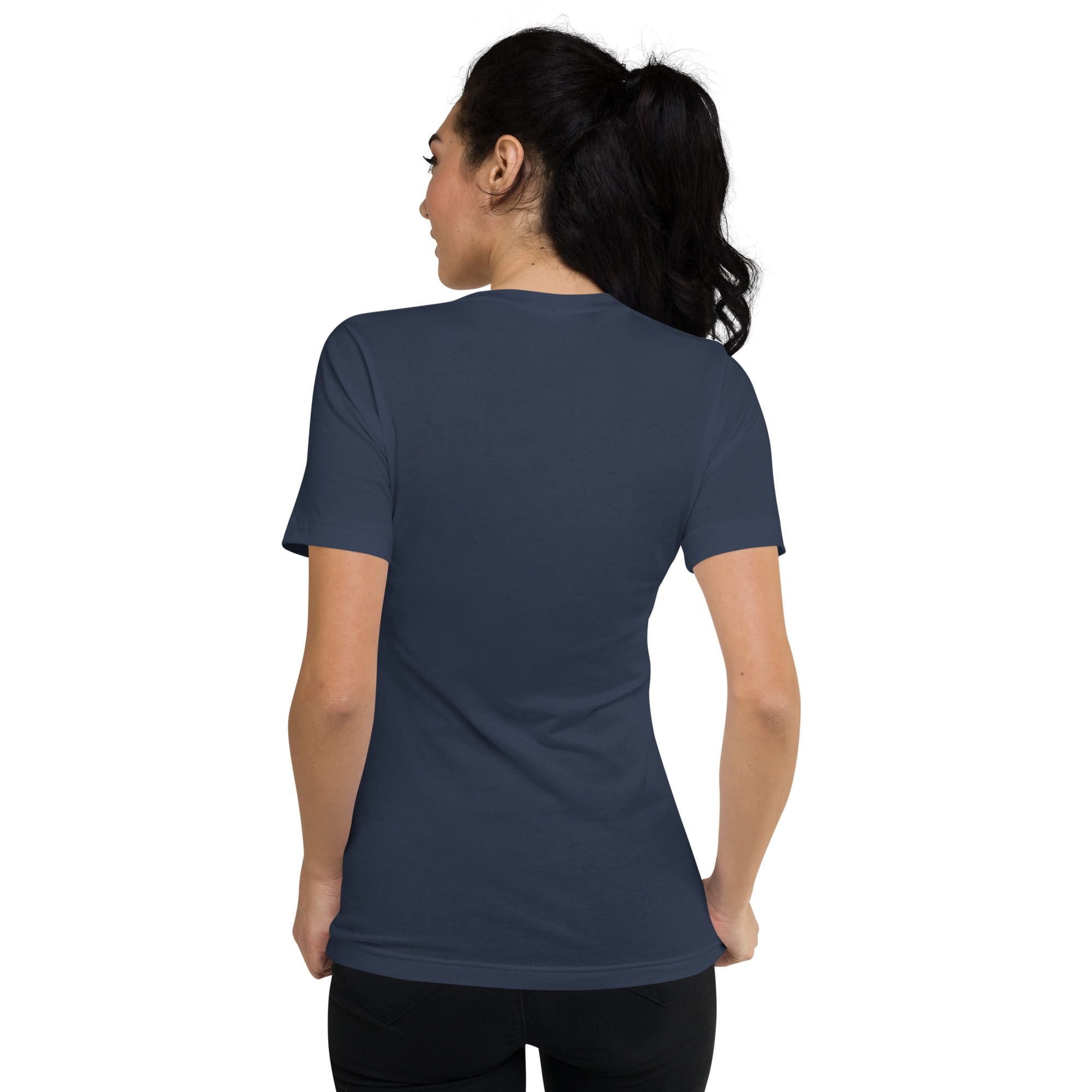 Woman wearing navy T-shirt, back view.