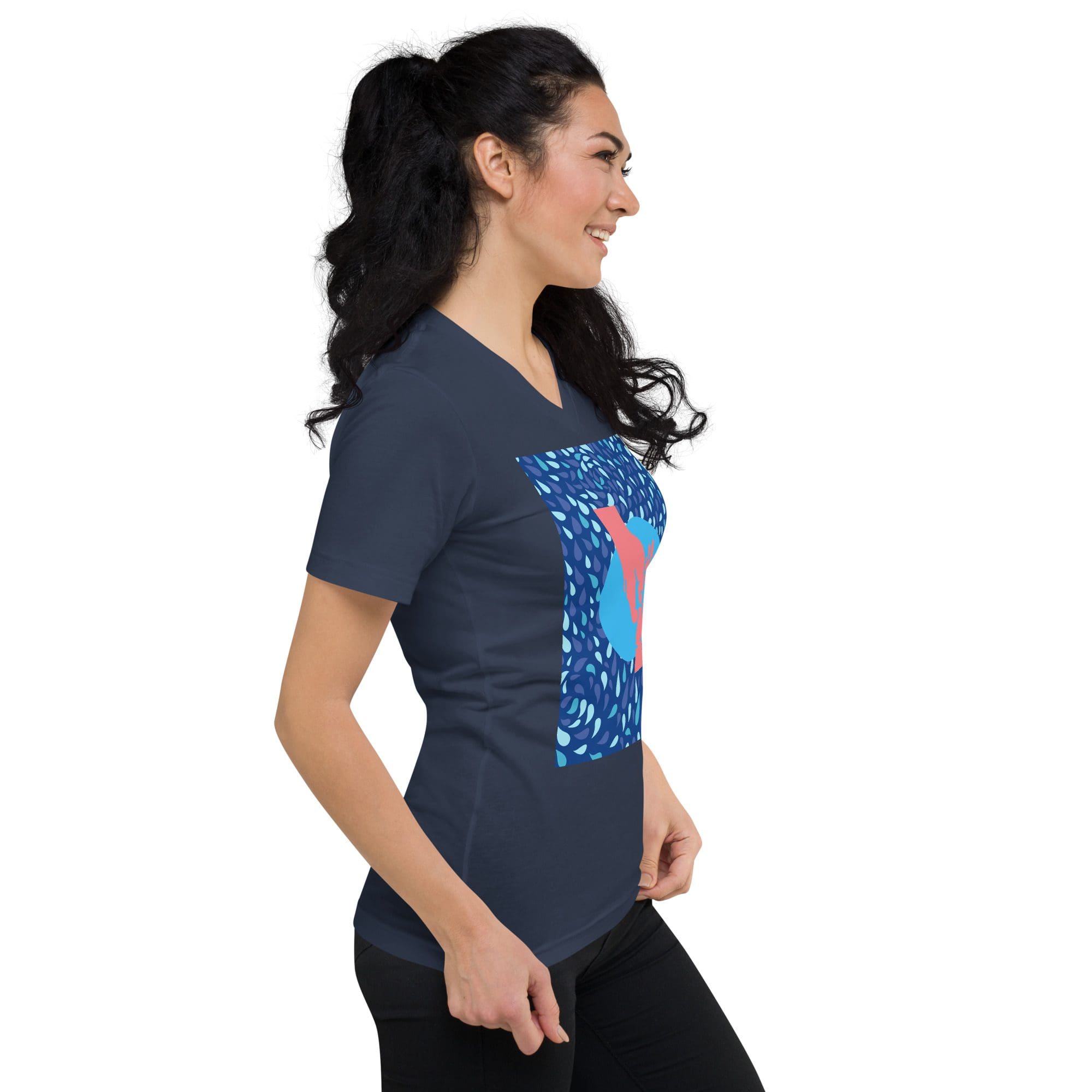 Smiling woman wearing navy graphic t-shirt