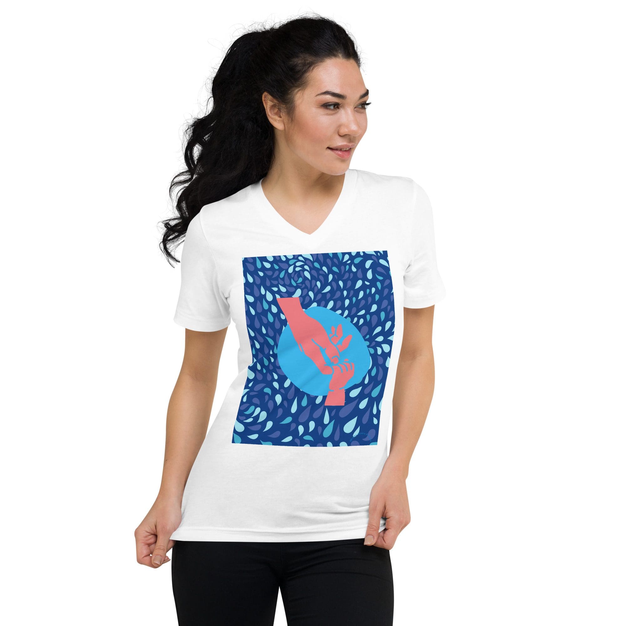 Woman wearing white shirt with abstract design.
